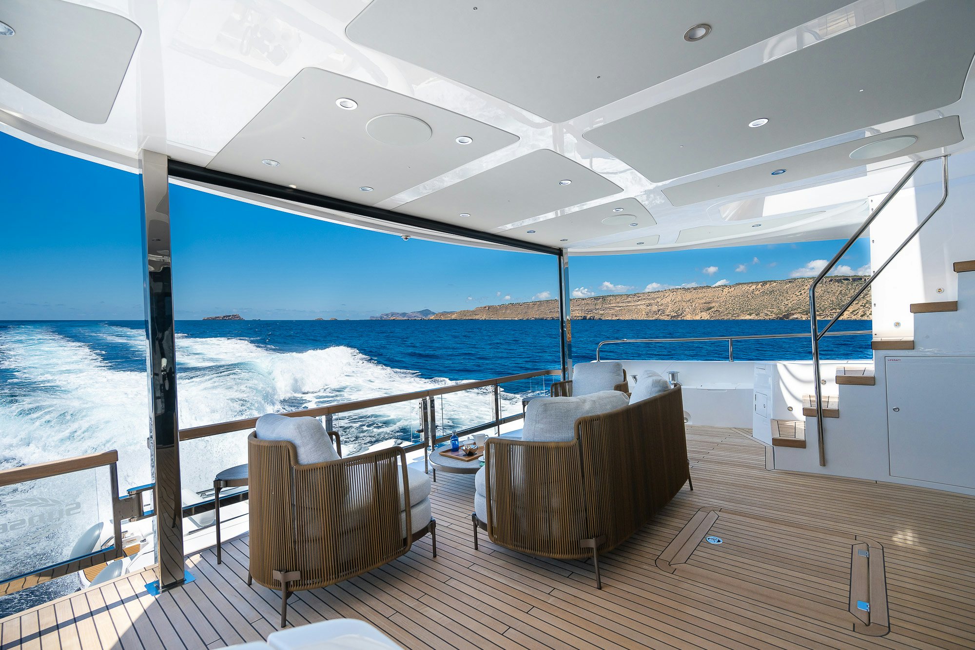a deck with a view of the ocean and the deck aboard CELESTE NOREEN Yacht for Sale