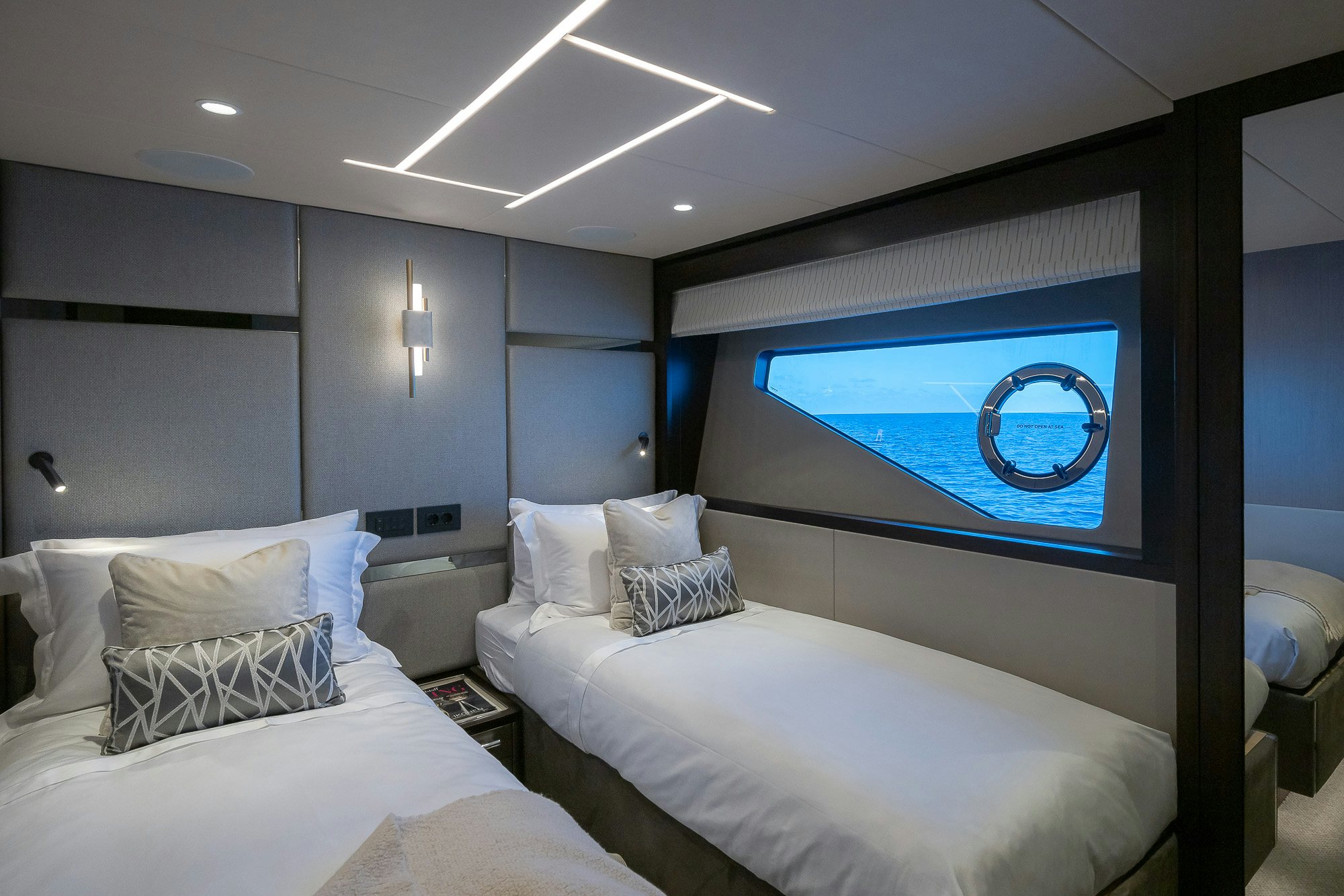 a room with a large window aboard CELESTE NOREEN Yacht for Sale