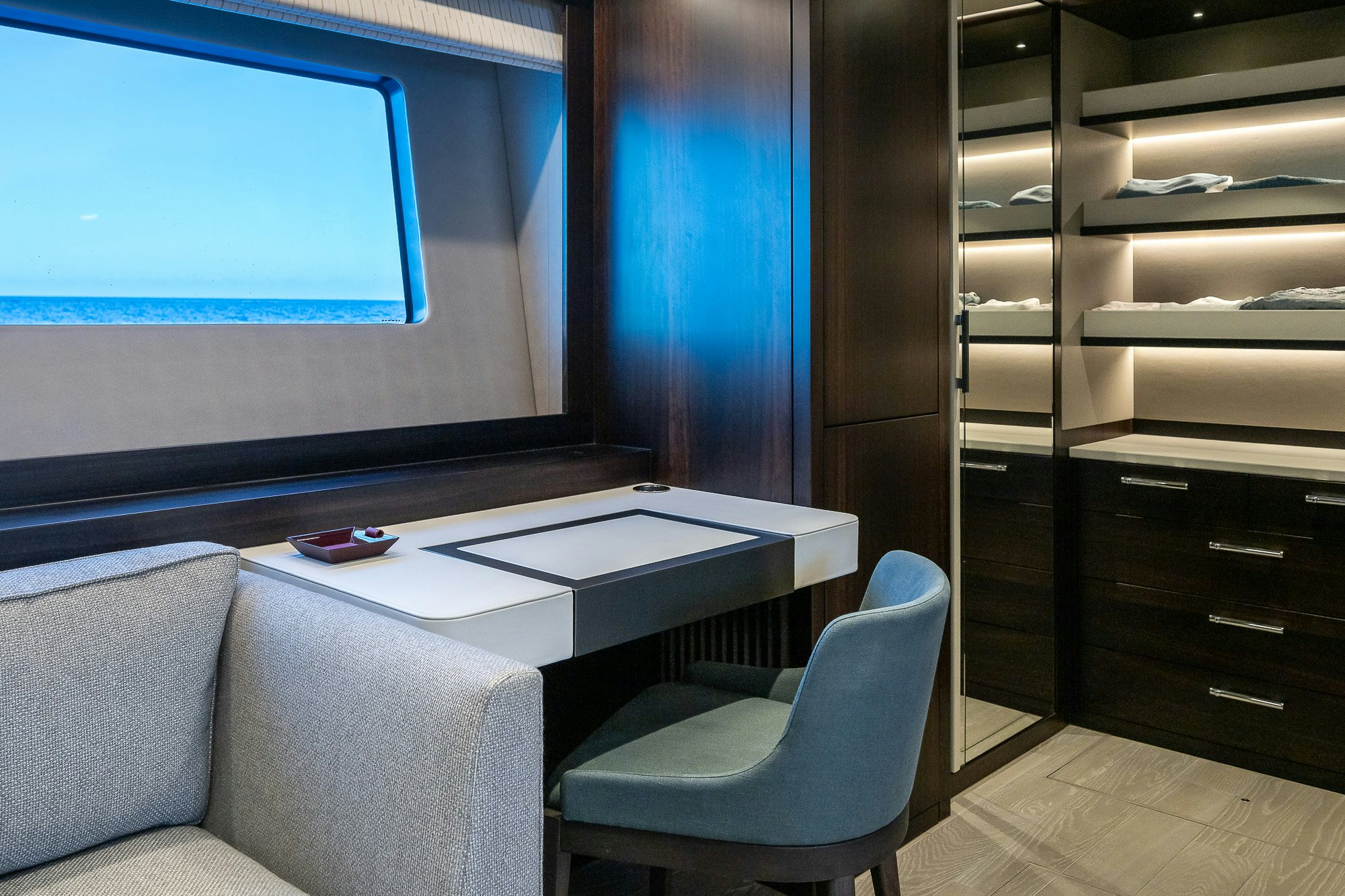 a room with a desk and a window aboard CELESTE NOREEN Yacht for Sale