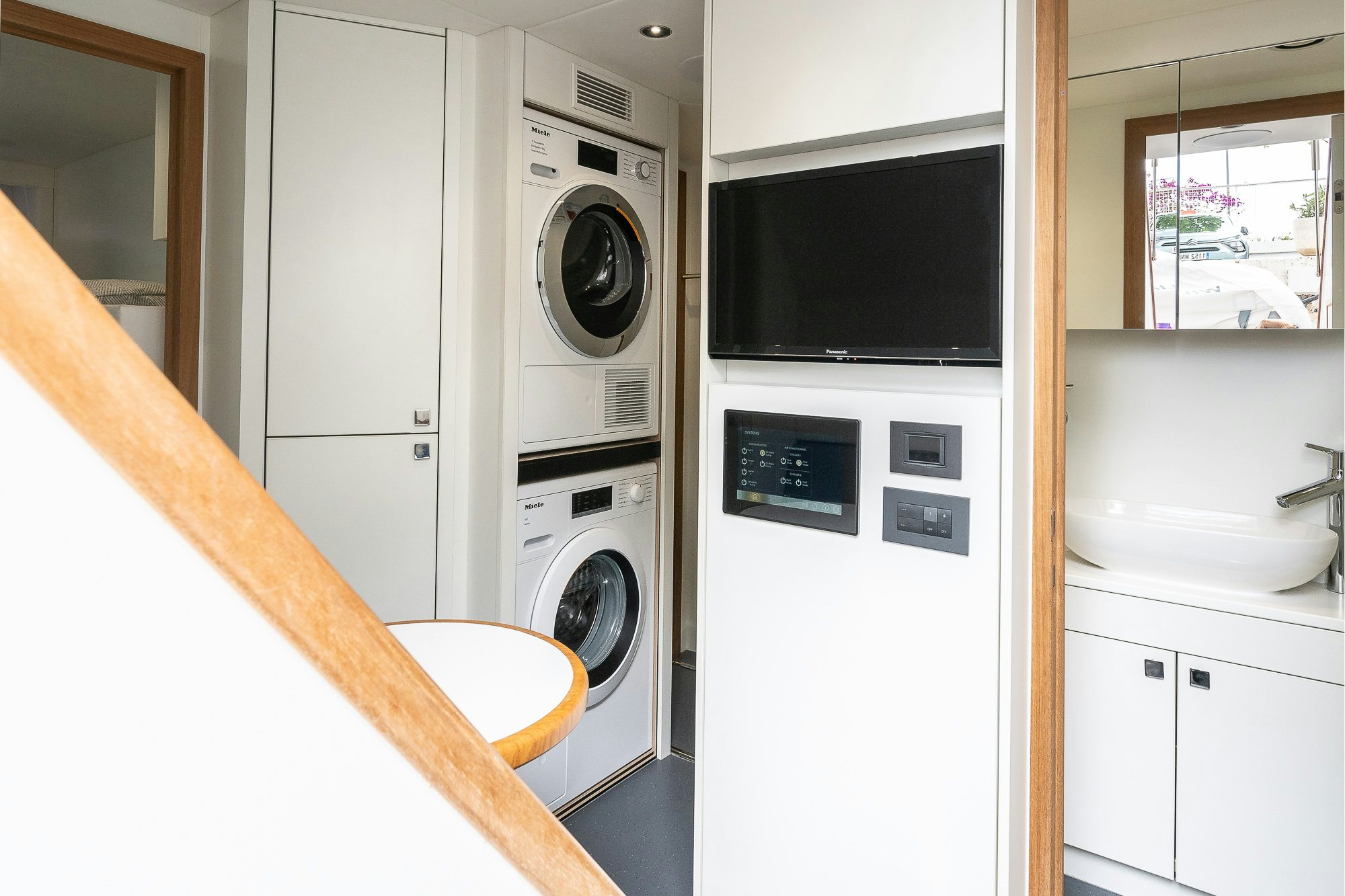 a washer and dryer in a room aboard CELESTE NOREEN Yacht for Sale