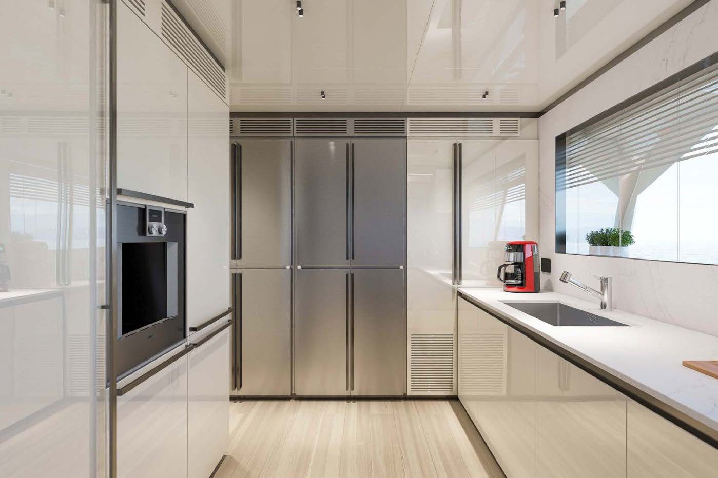 a kitchen with a microwave oven and a refrigerator aboard M Yacht for Charter