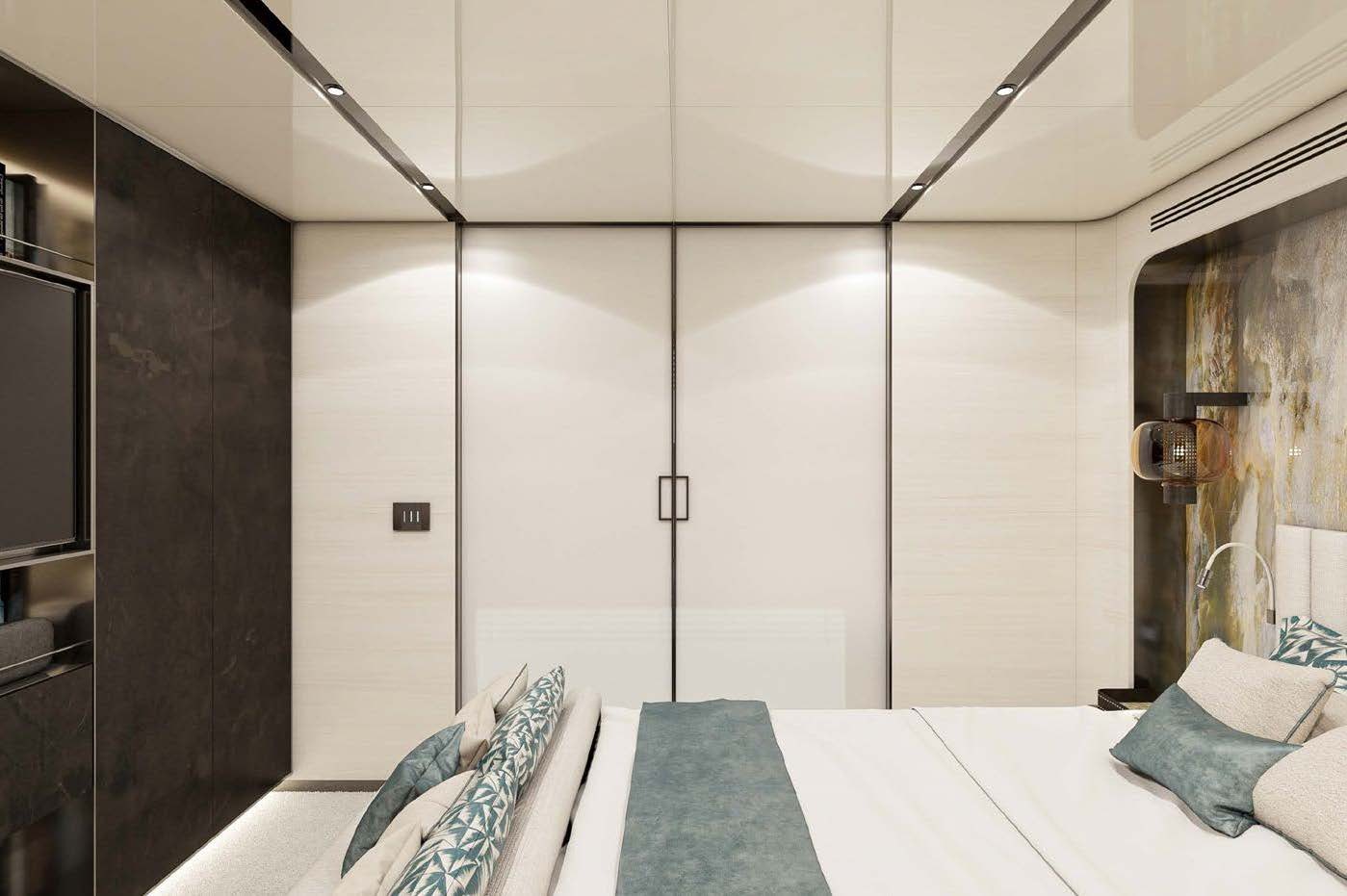 a room with a bed and a chair aboard M Yacht for Charter