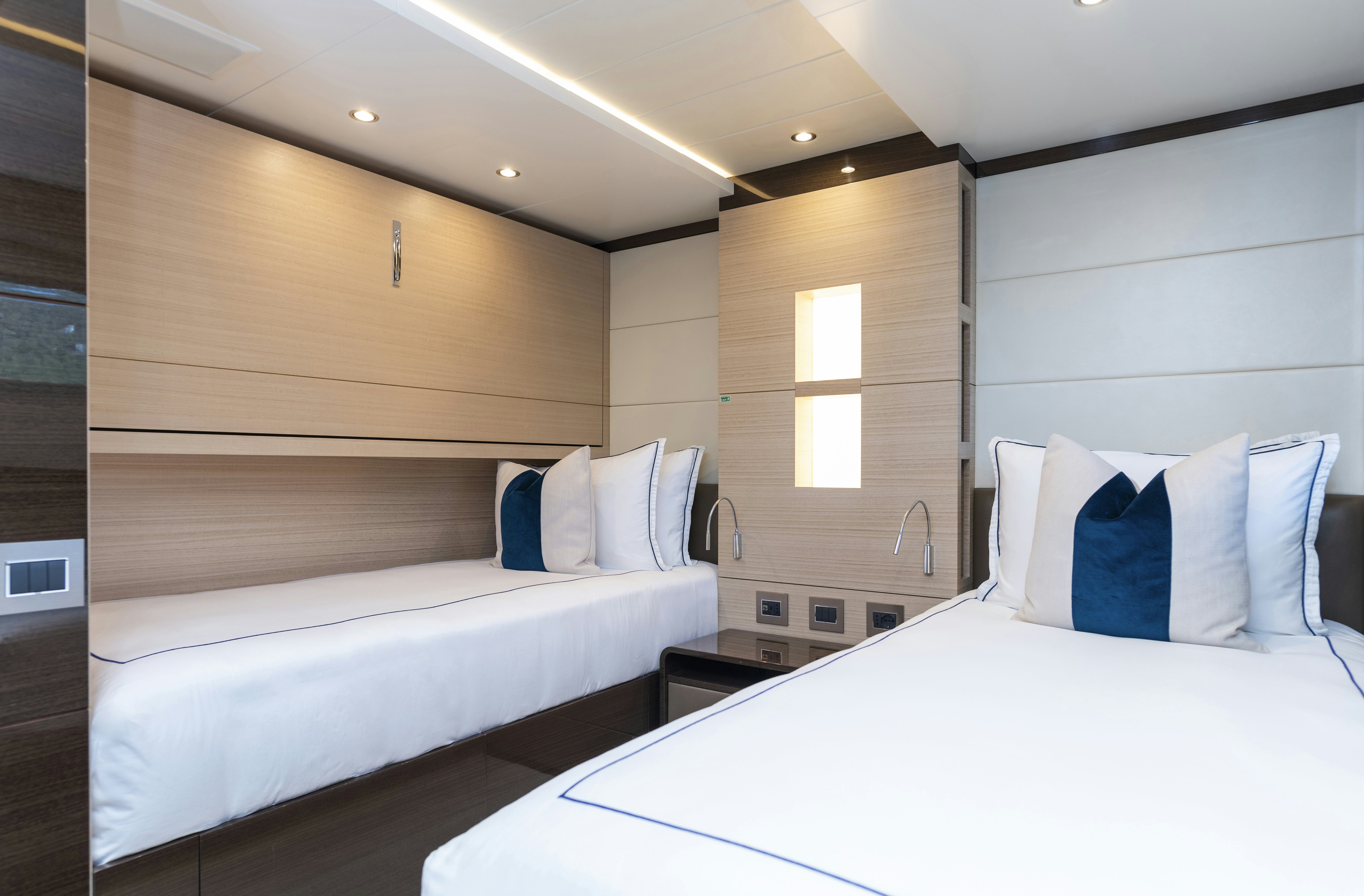 a room with two beds aboard WABASH Yacht for Sale