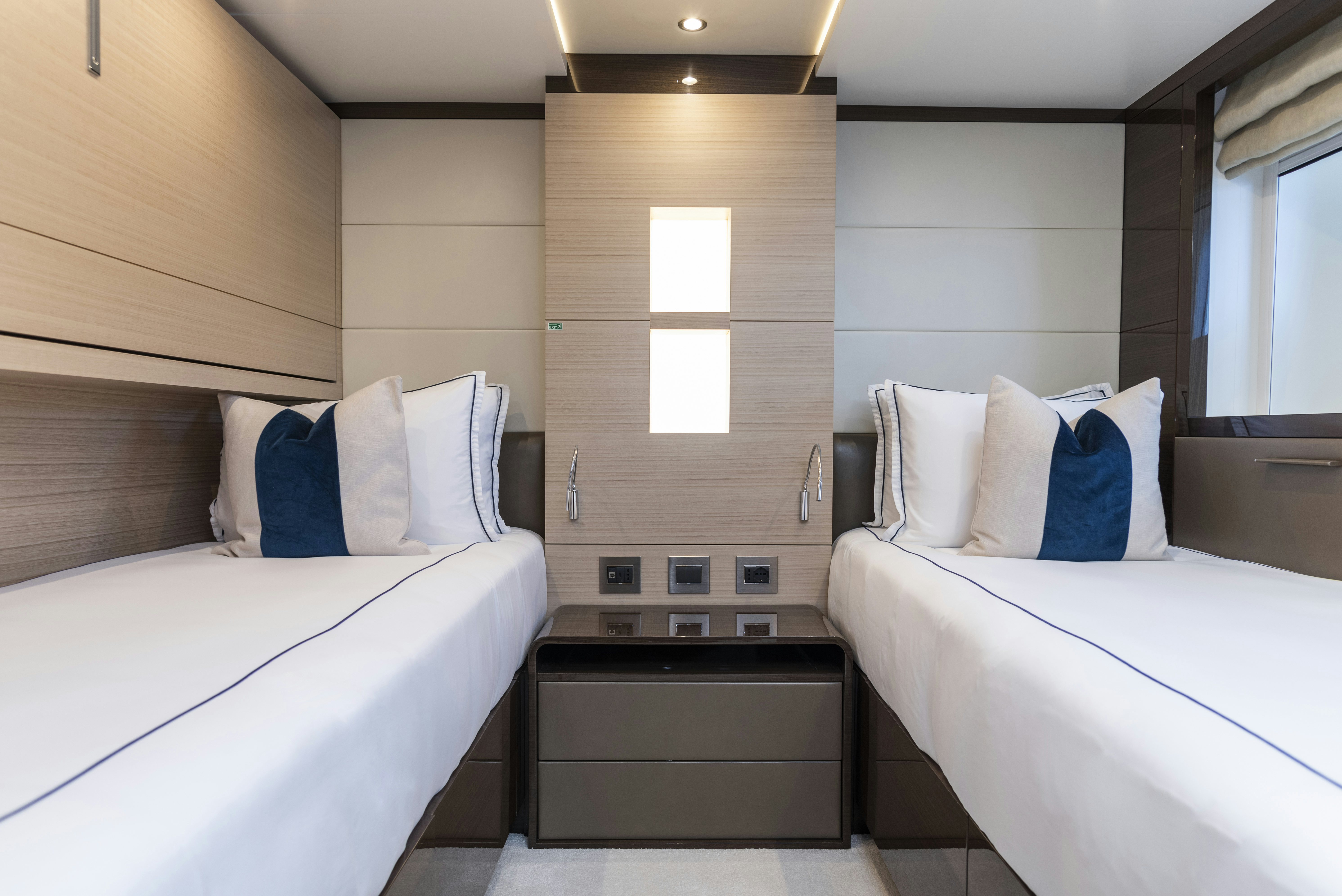 a room with two beds aboard WABASH Yacht for Sale