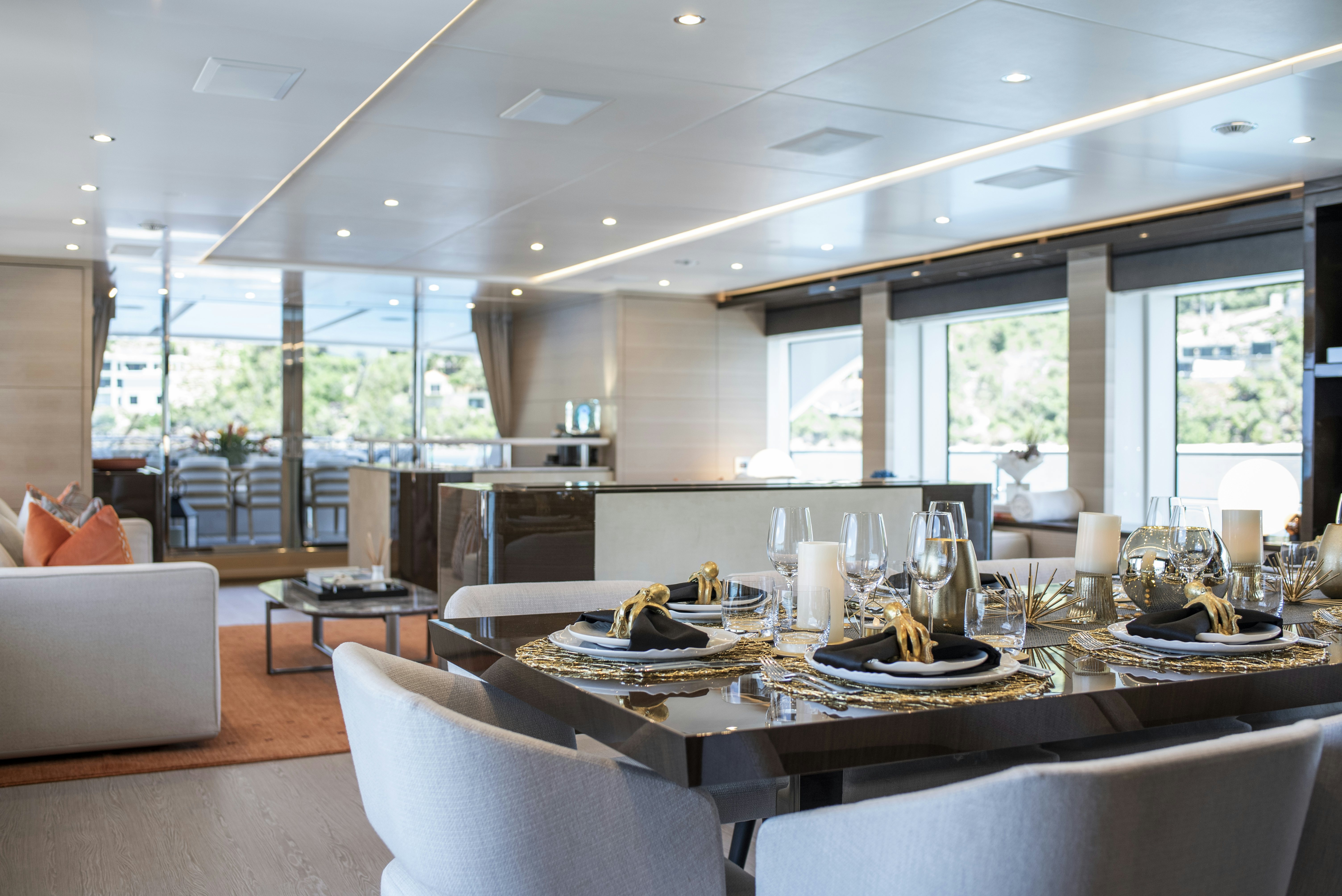 a large dining room with a large window aboard WABASH Yacht for Sale