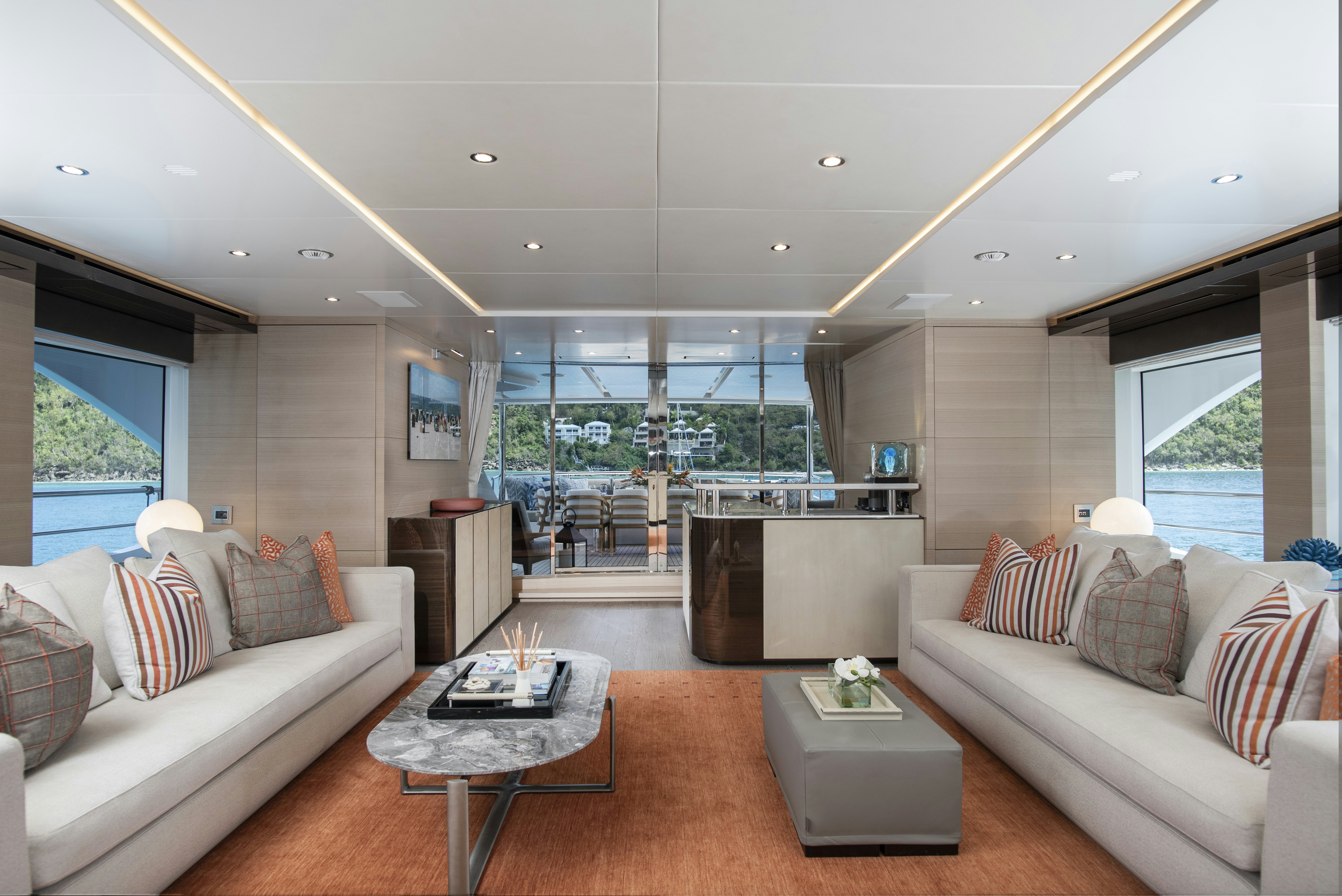 a living room with a large window aboard WABASH Yacht for Sale