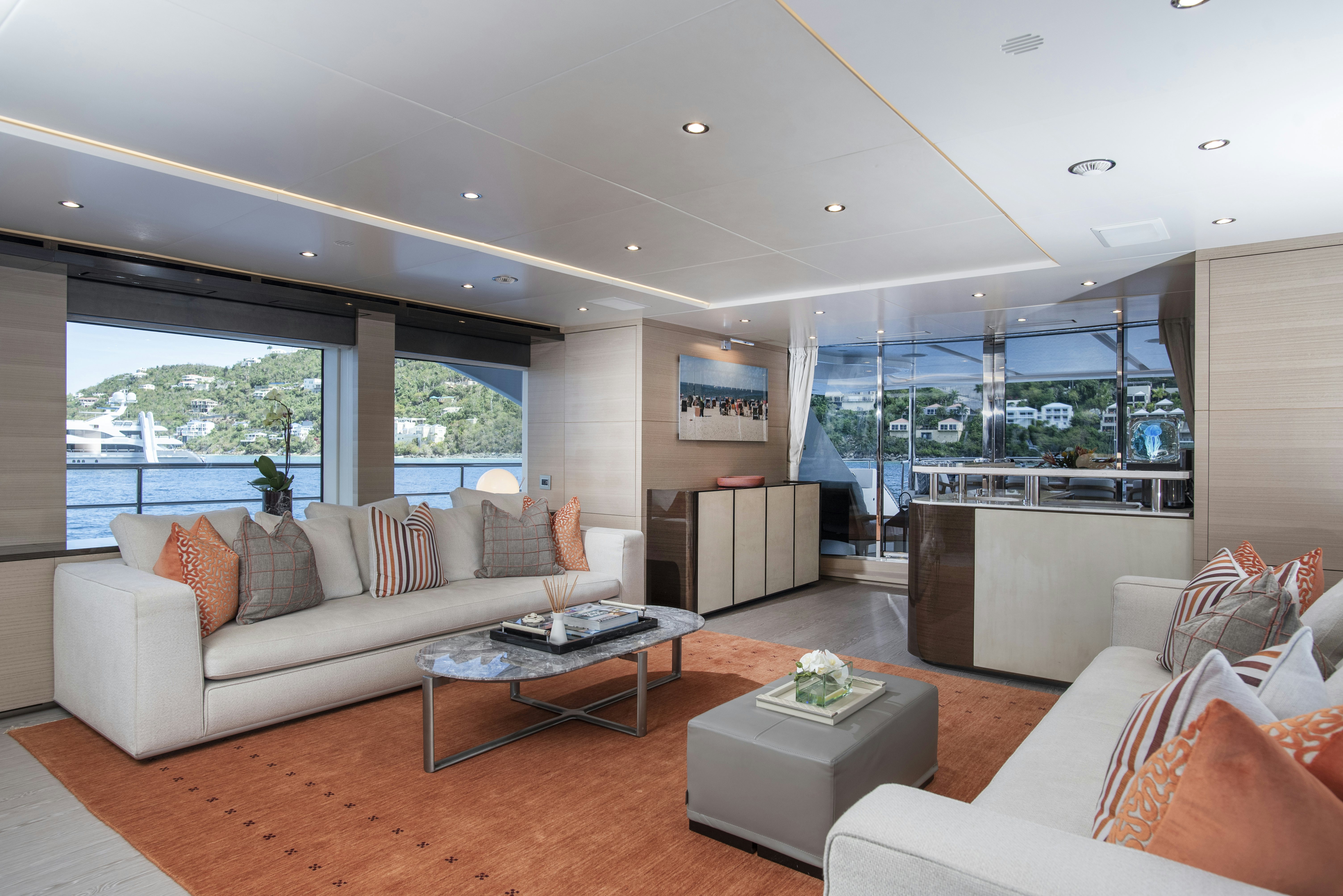 a living room with a large window aboard WABASH Yacht for Sale