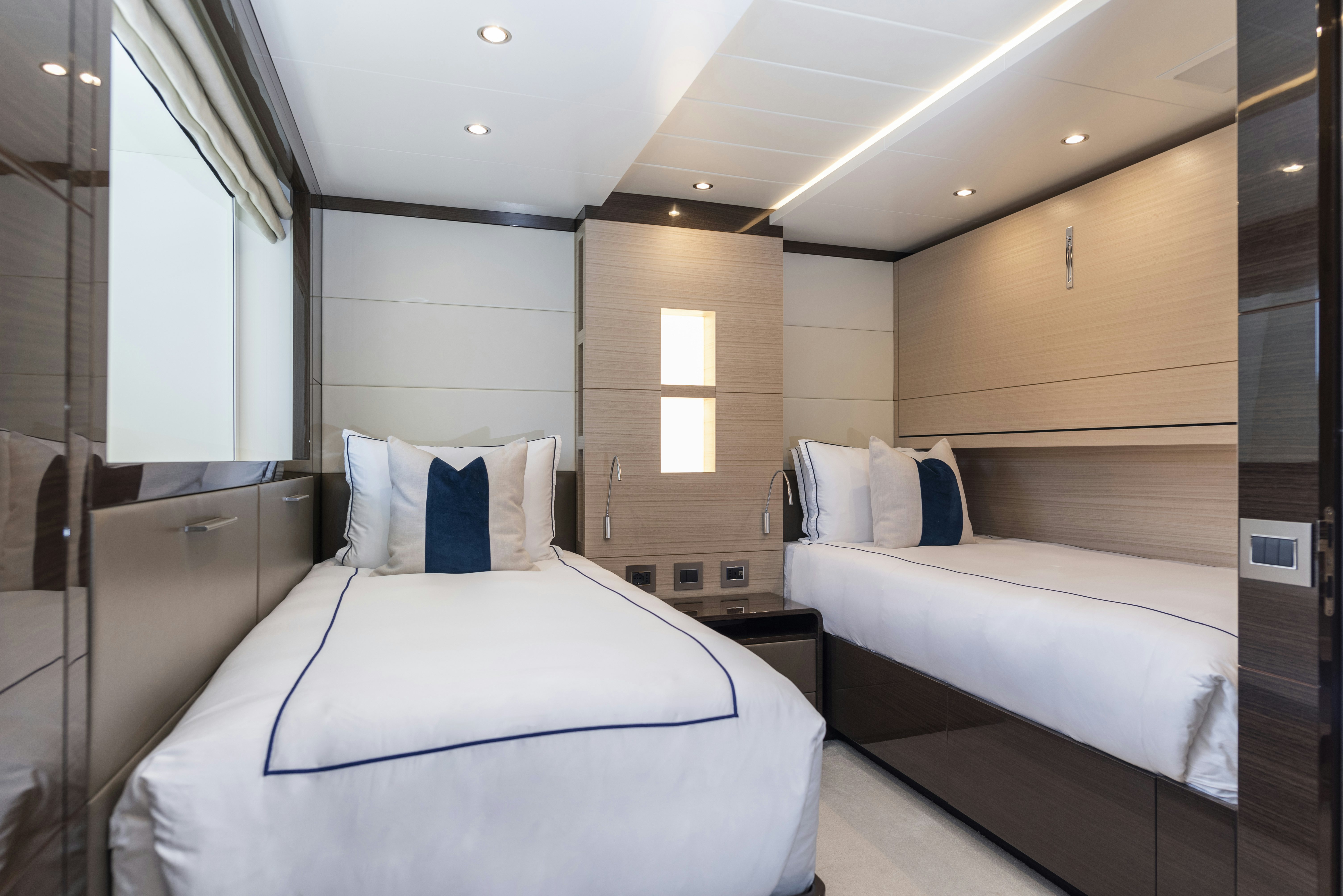 a room with two beds aboard WABASH Yacht for Sale