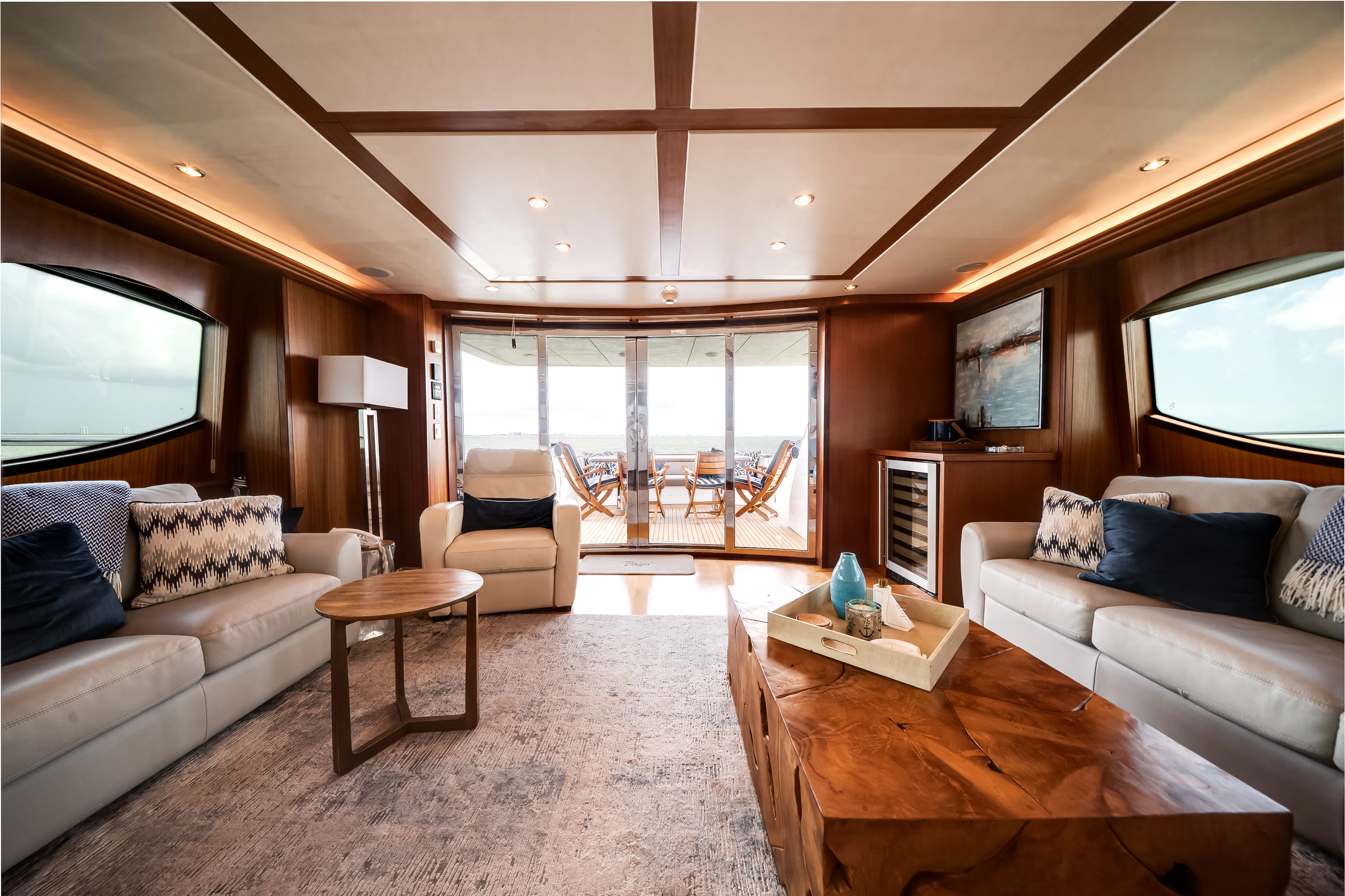 a living room with a large window aboard MR. CHIPS Yacht for Sale