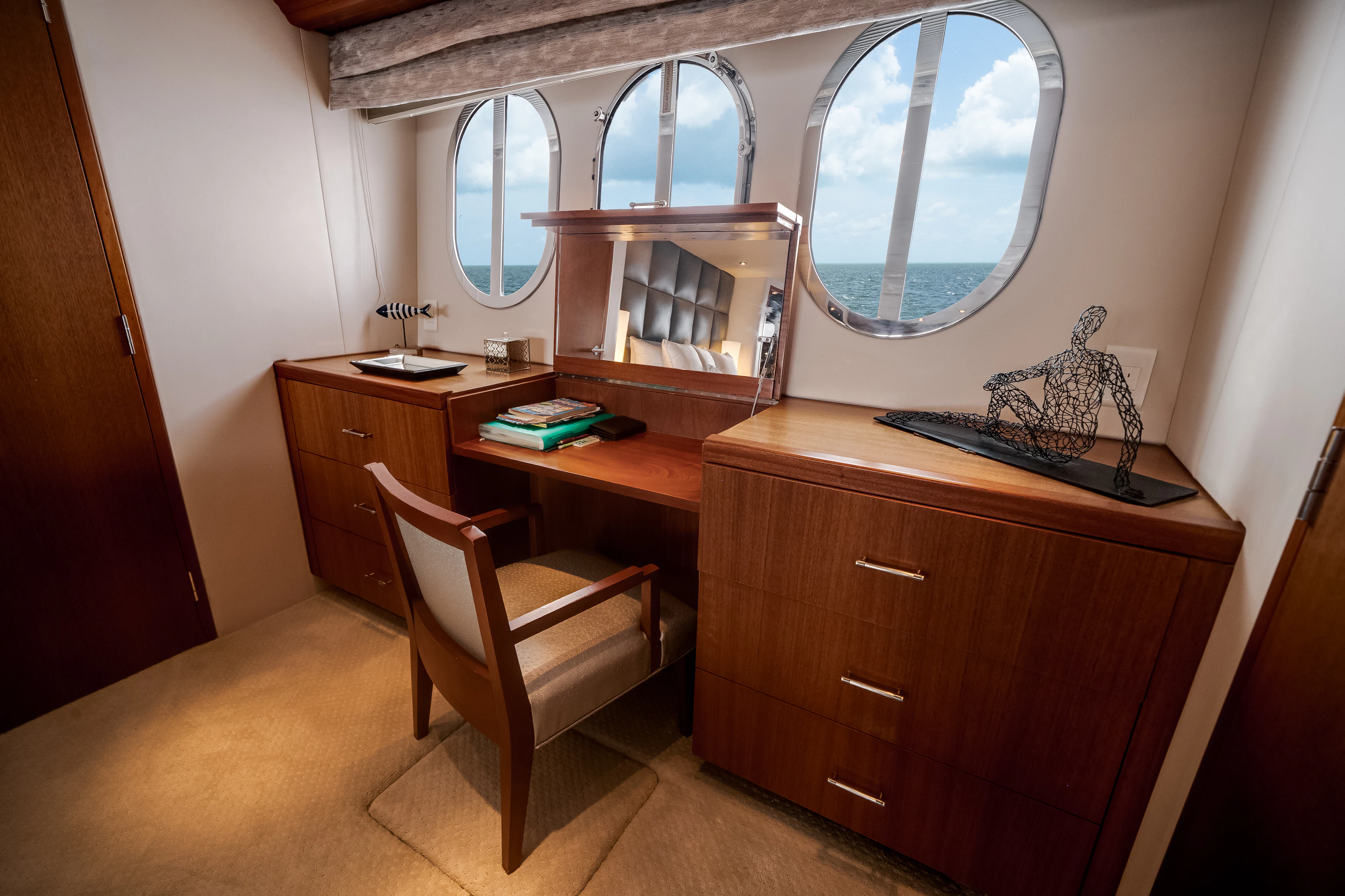 a room with a desk and a computer aboard MR. CHIPS Yacht for Sale