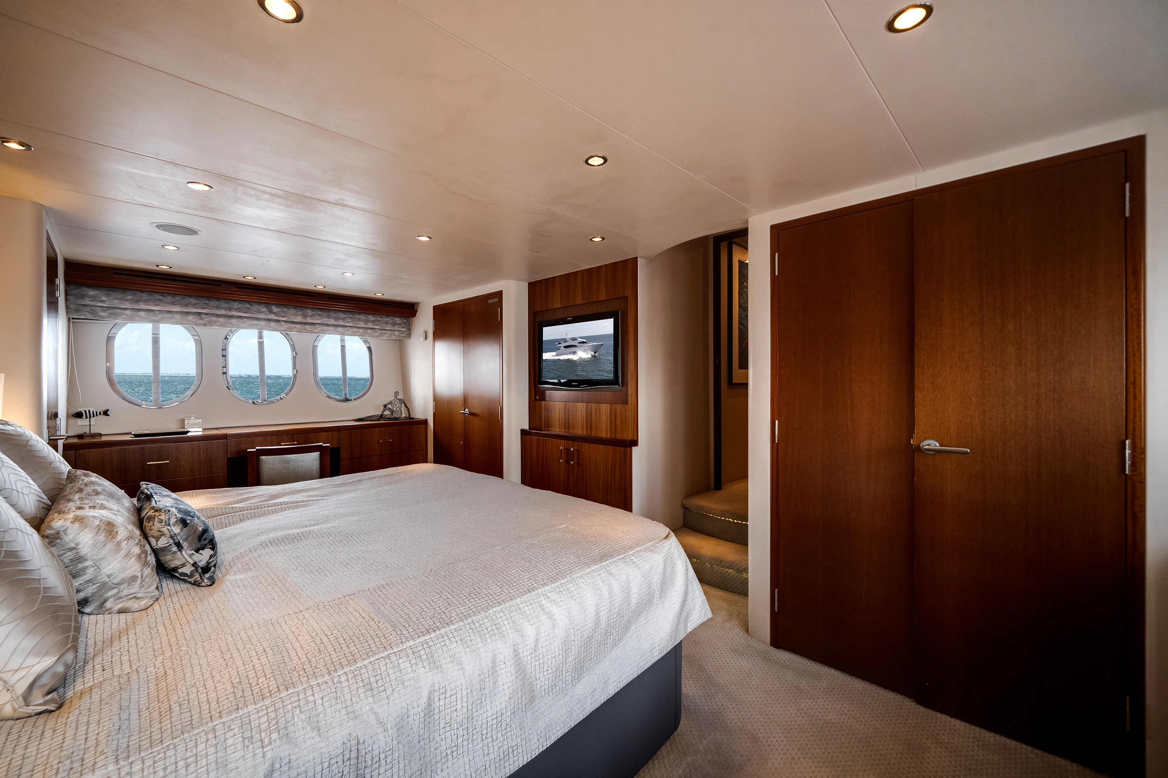 a bed in a room aboard MR. CHIPS Yacht for Sale