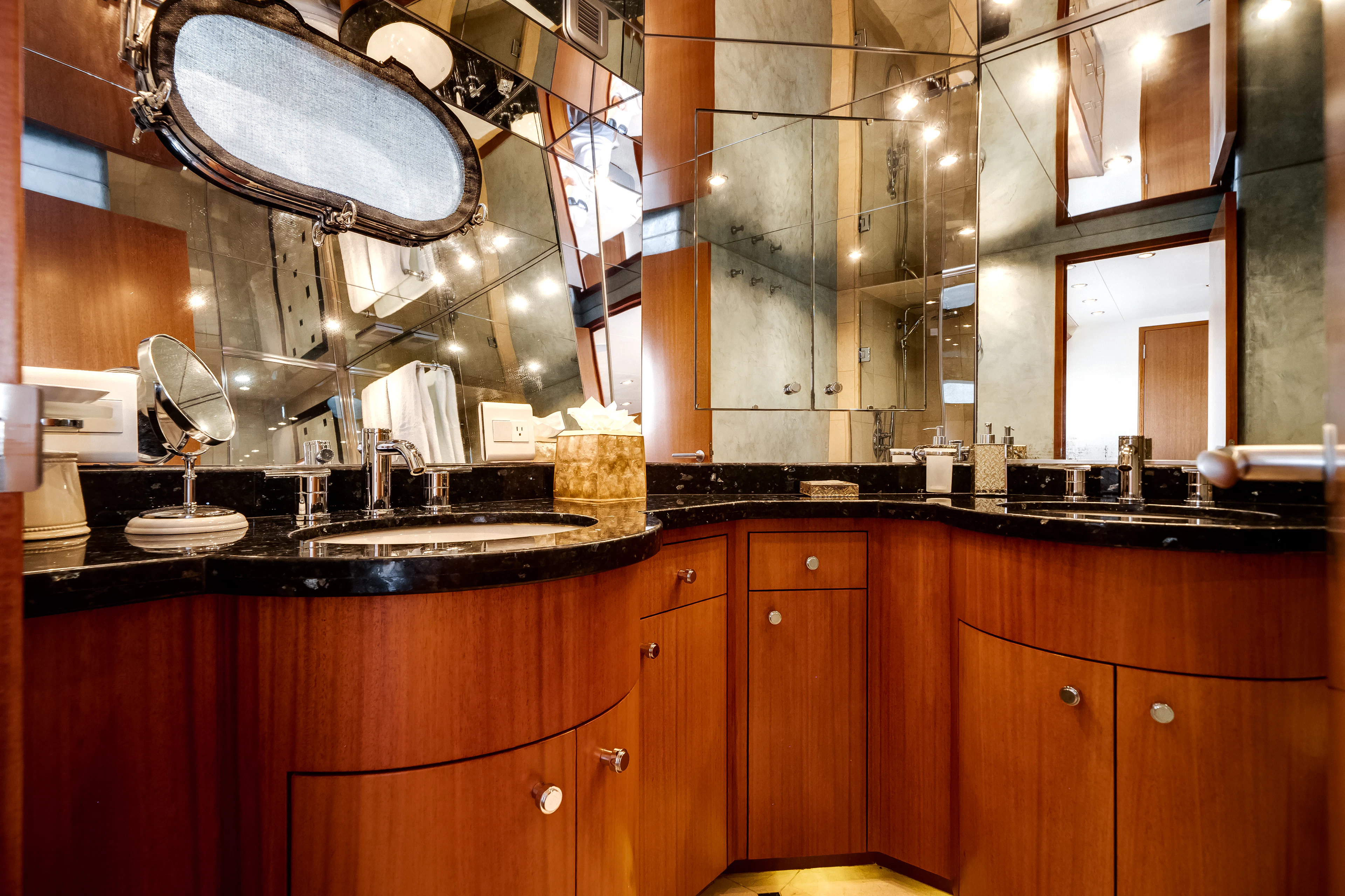 a kitchen with wooden cabinets aboard MR. CHIPS Yacht for Sale