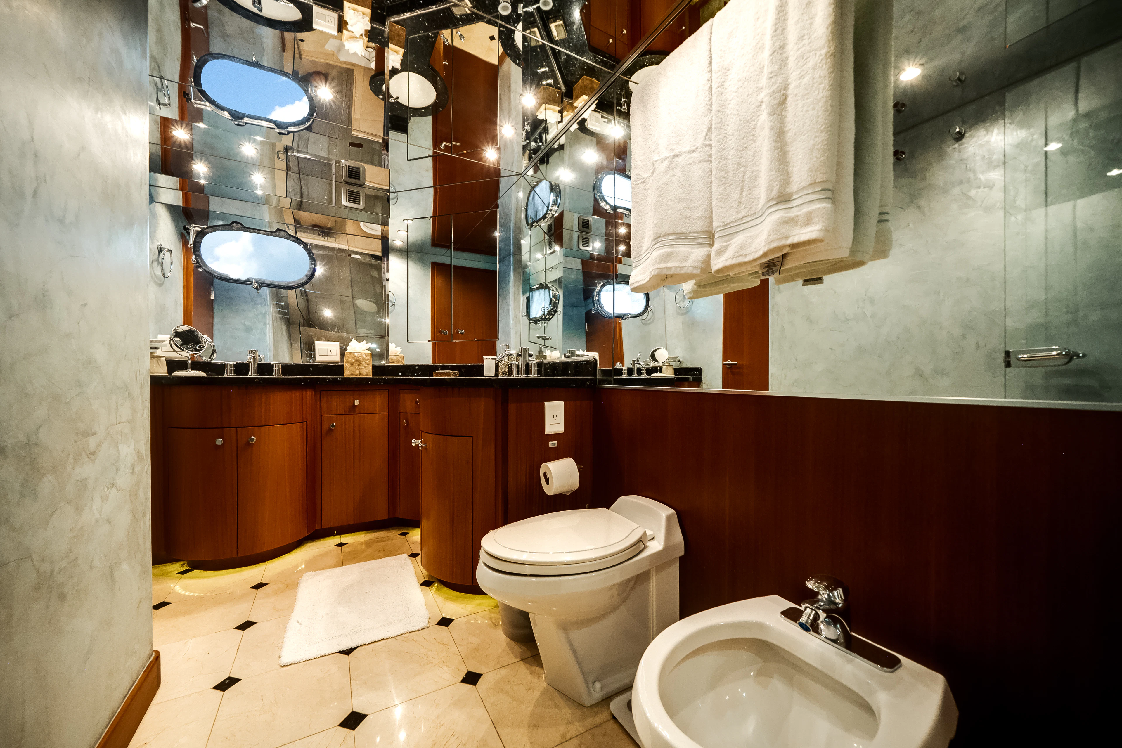 a bathroom with a toilet and a sink aboard MR. CHIPS Yacht for Sale
