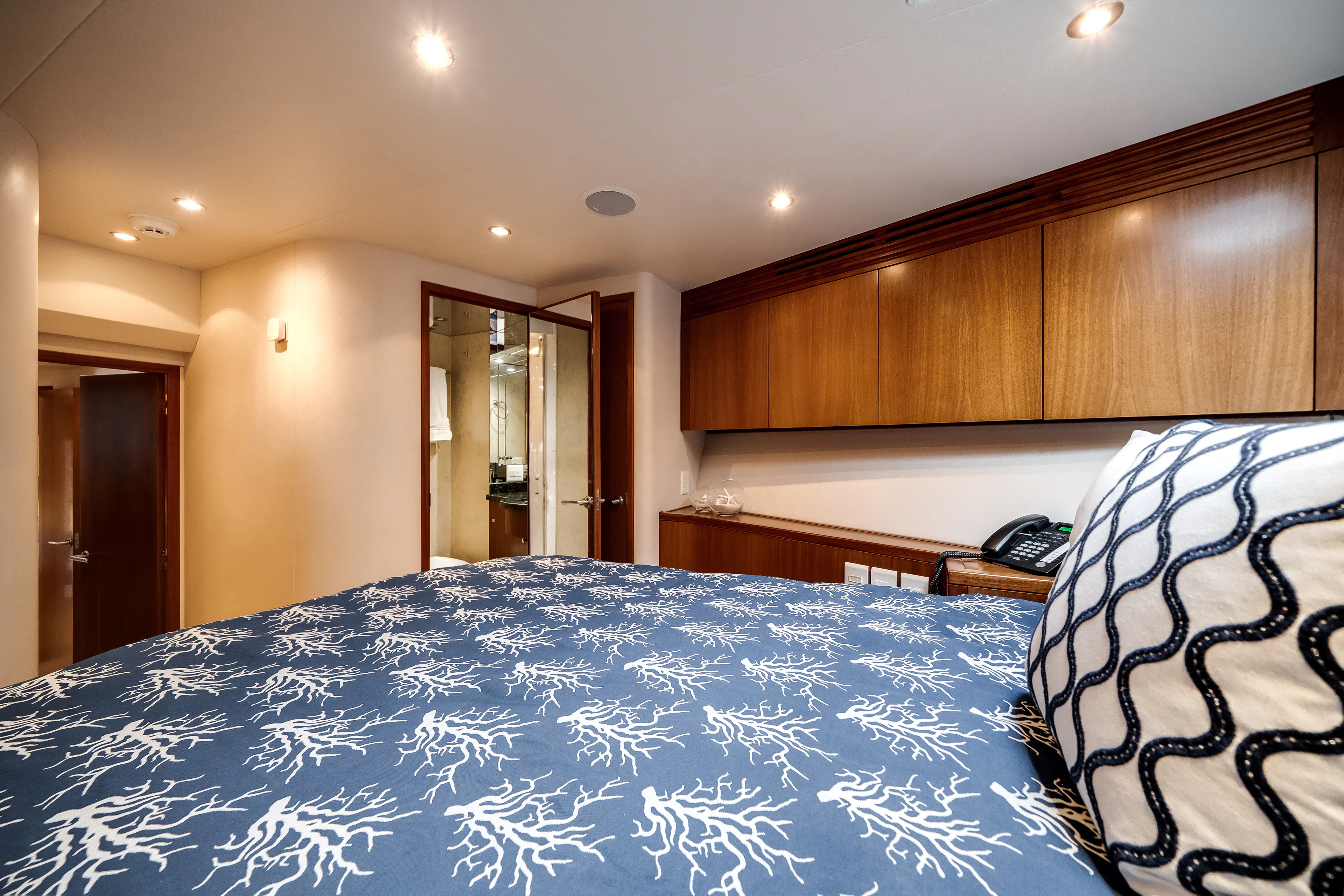 a large room with a blue and white patterned tablecloth aboard MR. CHIPS Yacht for Sale