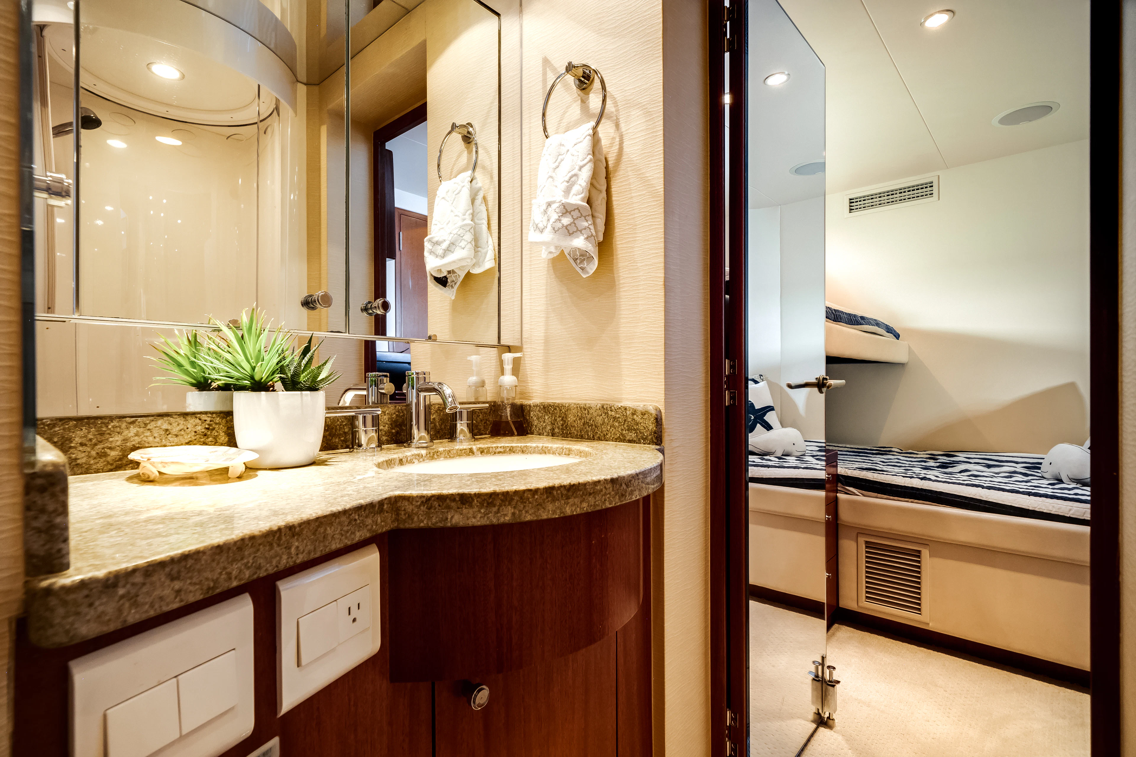 a bathroom with a large countertop aboard MR. CHIPS Yacht for Sale