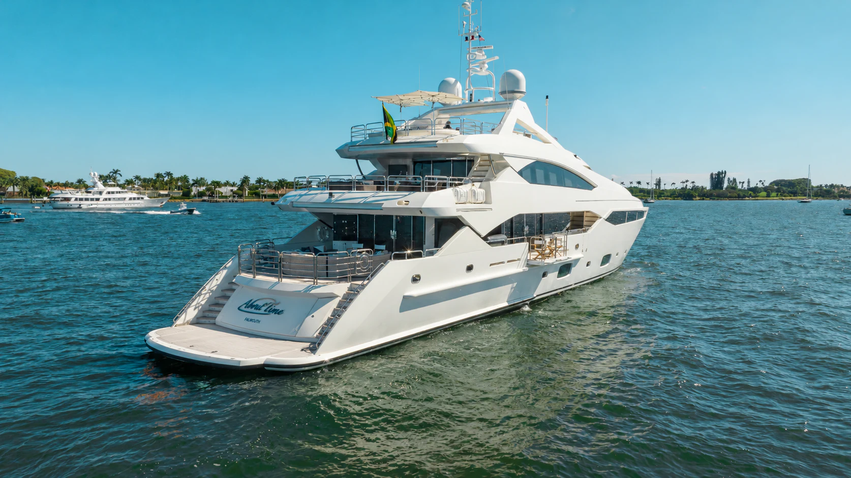 a large white boat in the water aboard ABOUT TIME Yacht for Sale