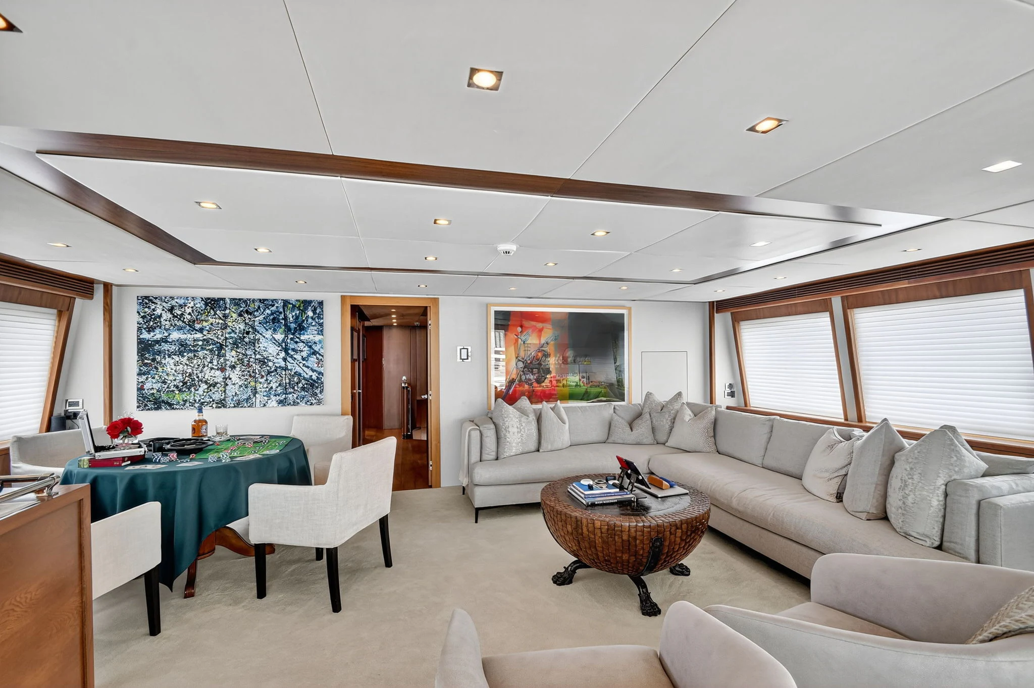 a living room with a couch and a table aboard ABOUT TIME Yacht for Sale