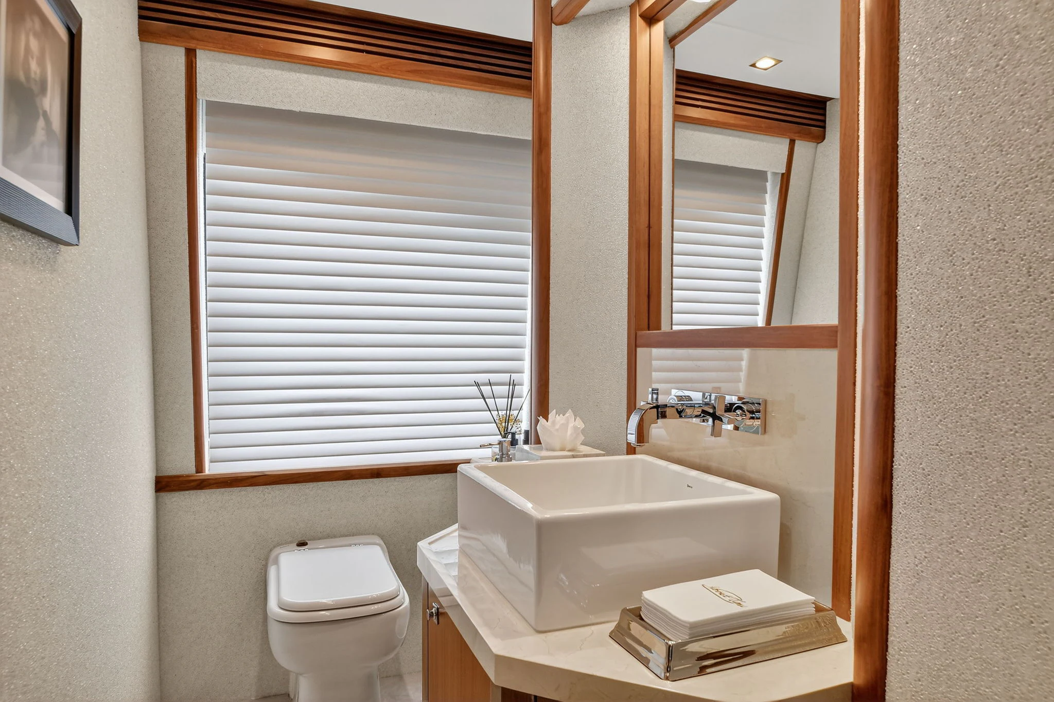a bathroom with a sink and a toilet aboard ABOUT TIME Yacht for Sale