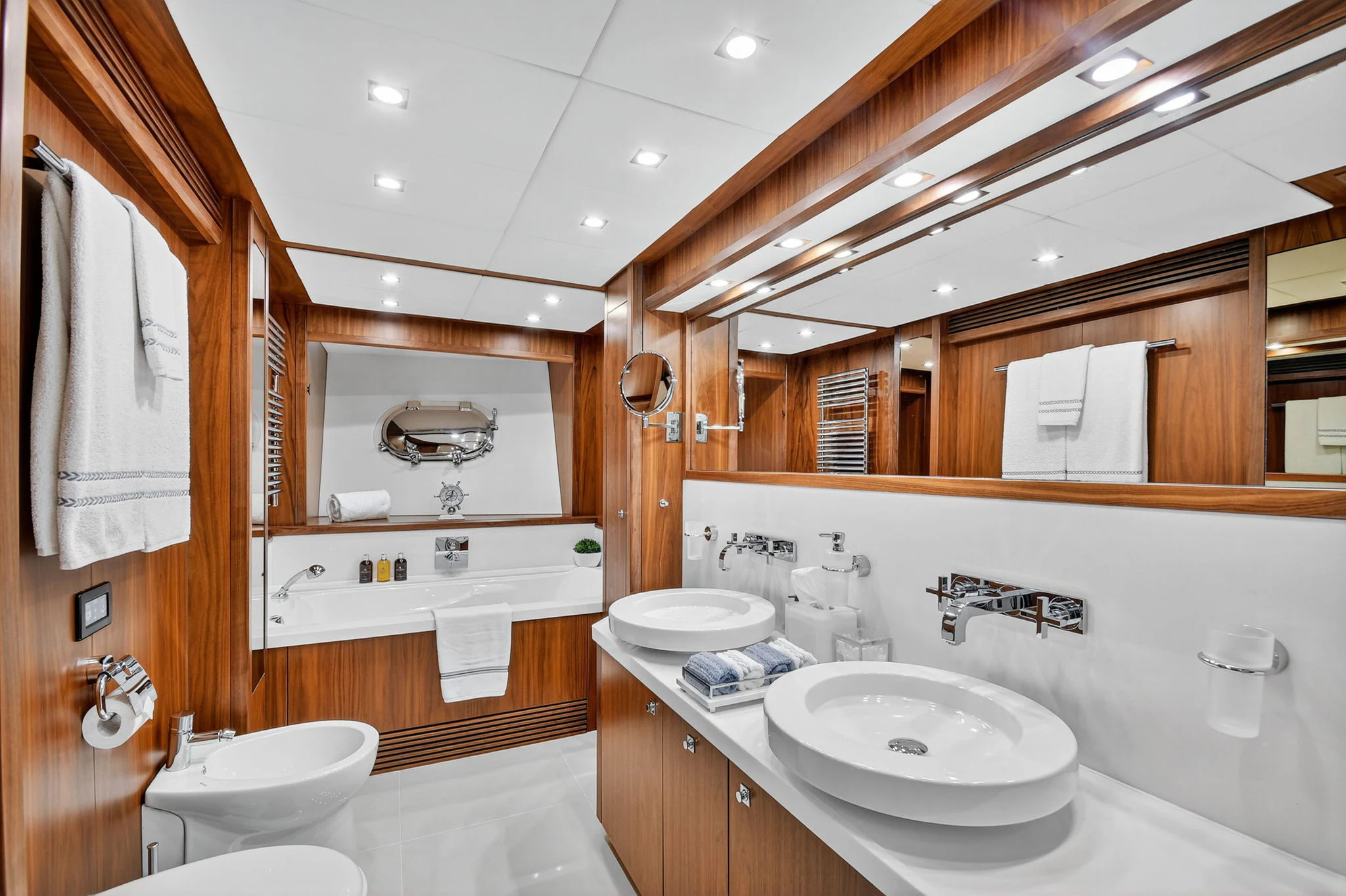 a bathroom with a sink and a mirror aboard ABOUT TIME Yacht for Sale