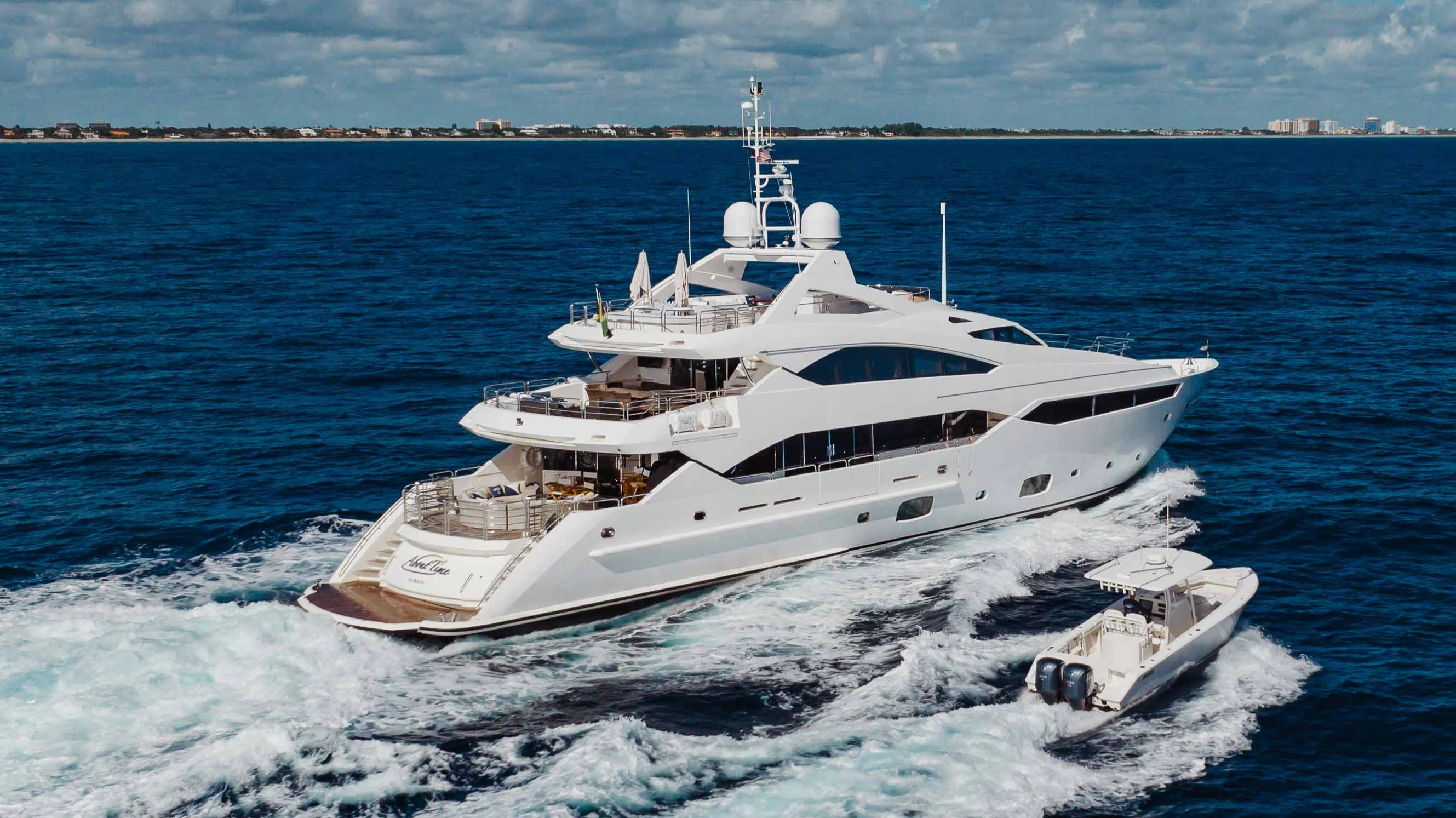 a white yacht in the water aboard ABOUT TIME Yacht for Sale