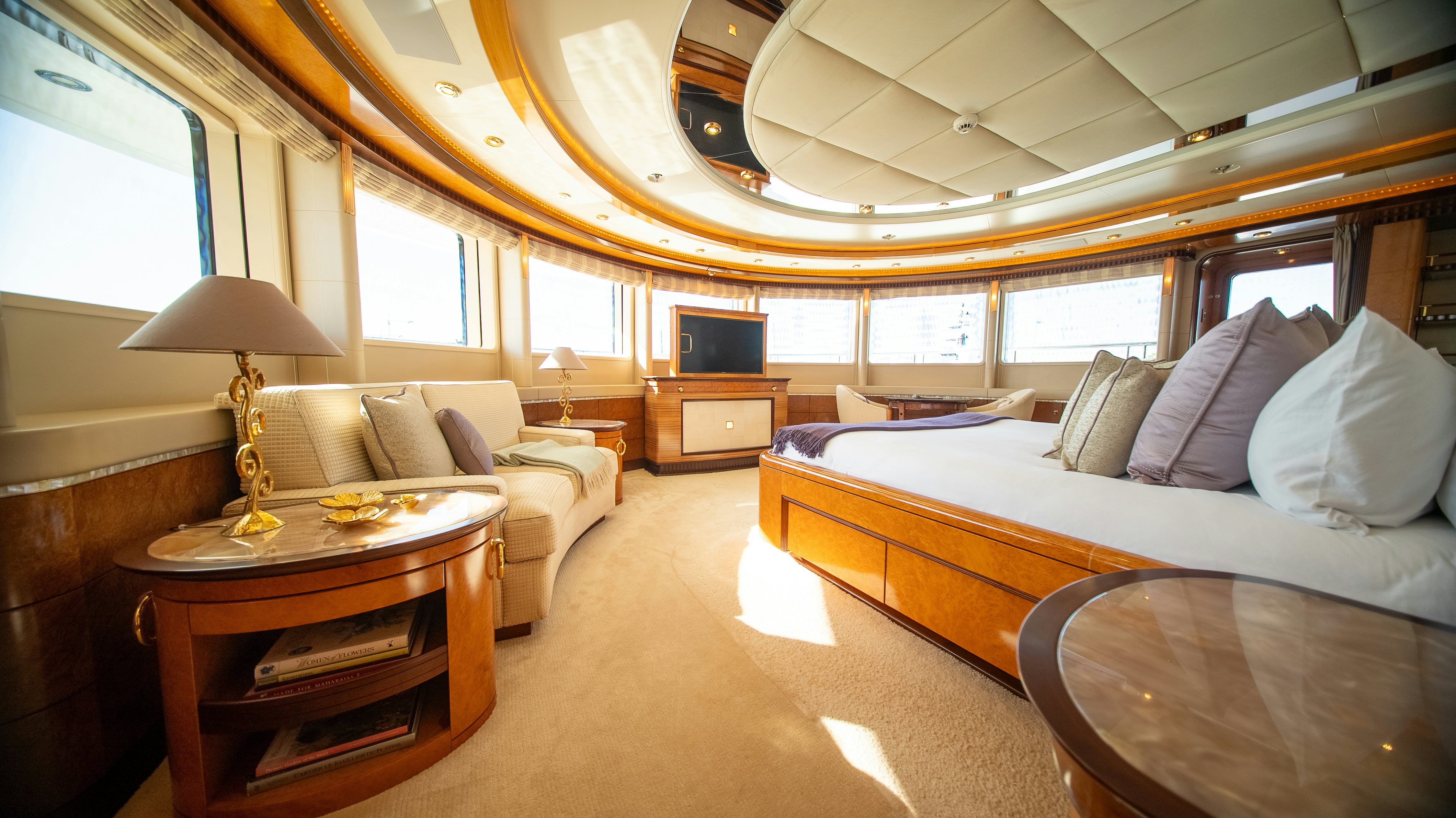 a large bedroom with a large bed aboard LUDZIE Yacht for Charter