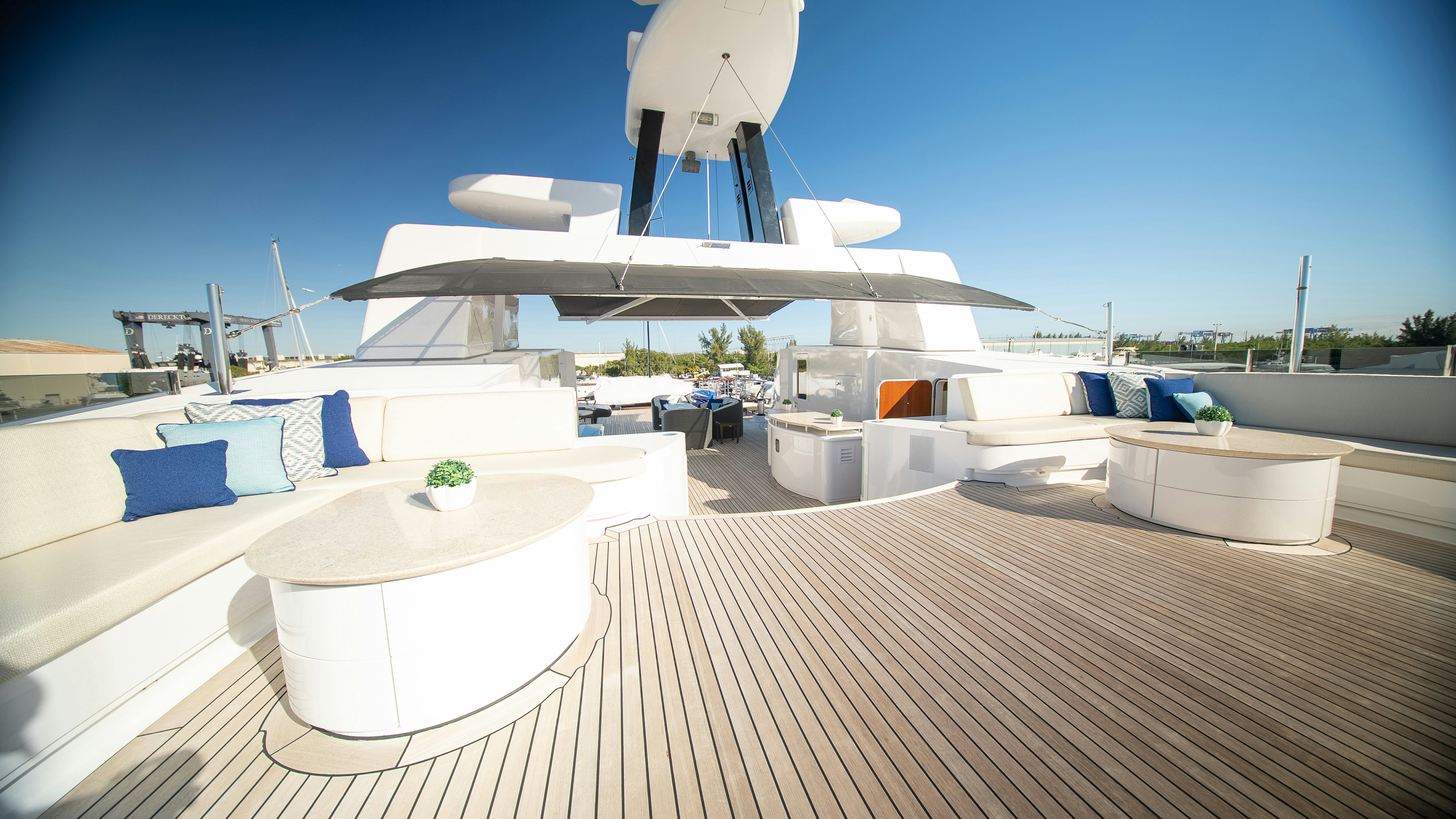 a deck with a large white building and a white satellite dish on it aboard LUDZIE Yacht for Charter