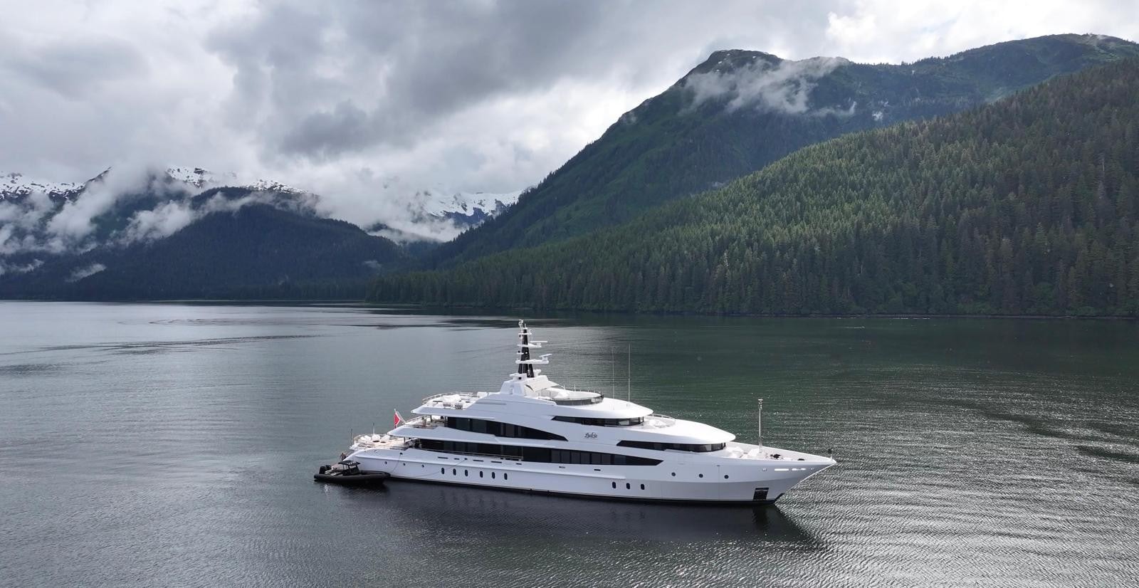 a white boat in the water aboard LUDZIE Yacht for Charter