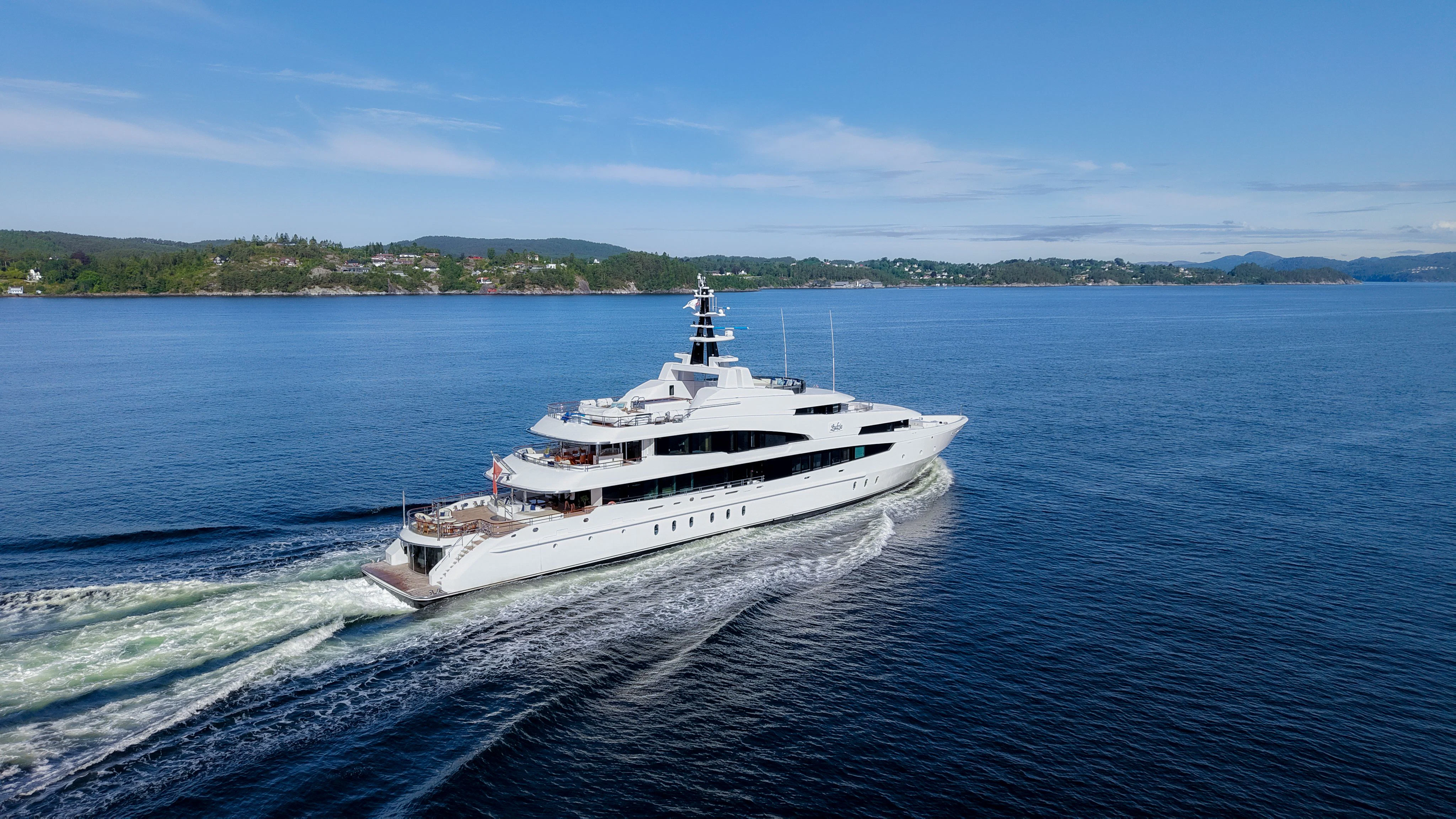 a white boat on the water aboard LUDZIE Yacht for Charter