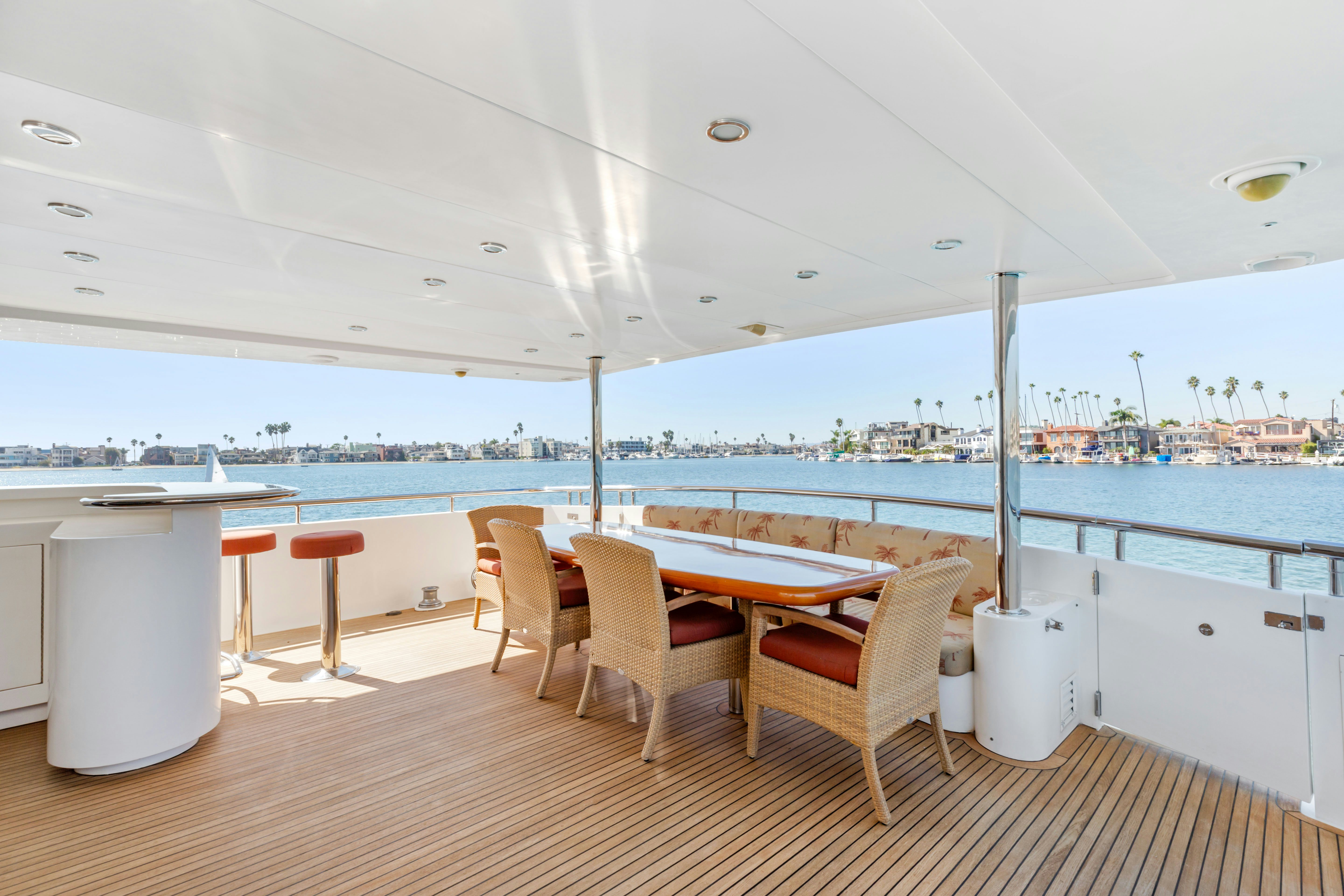 a room with a table and chairs aboard REVERIE Yacht for Sale