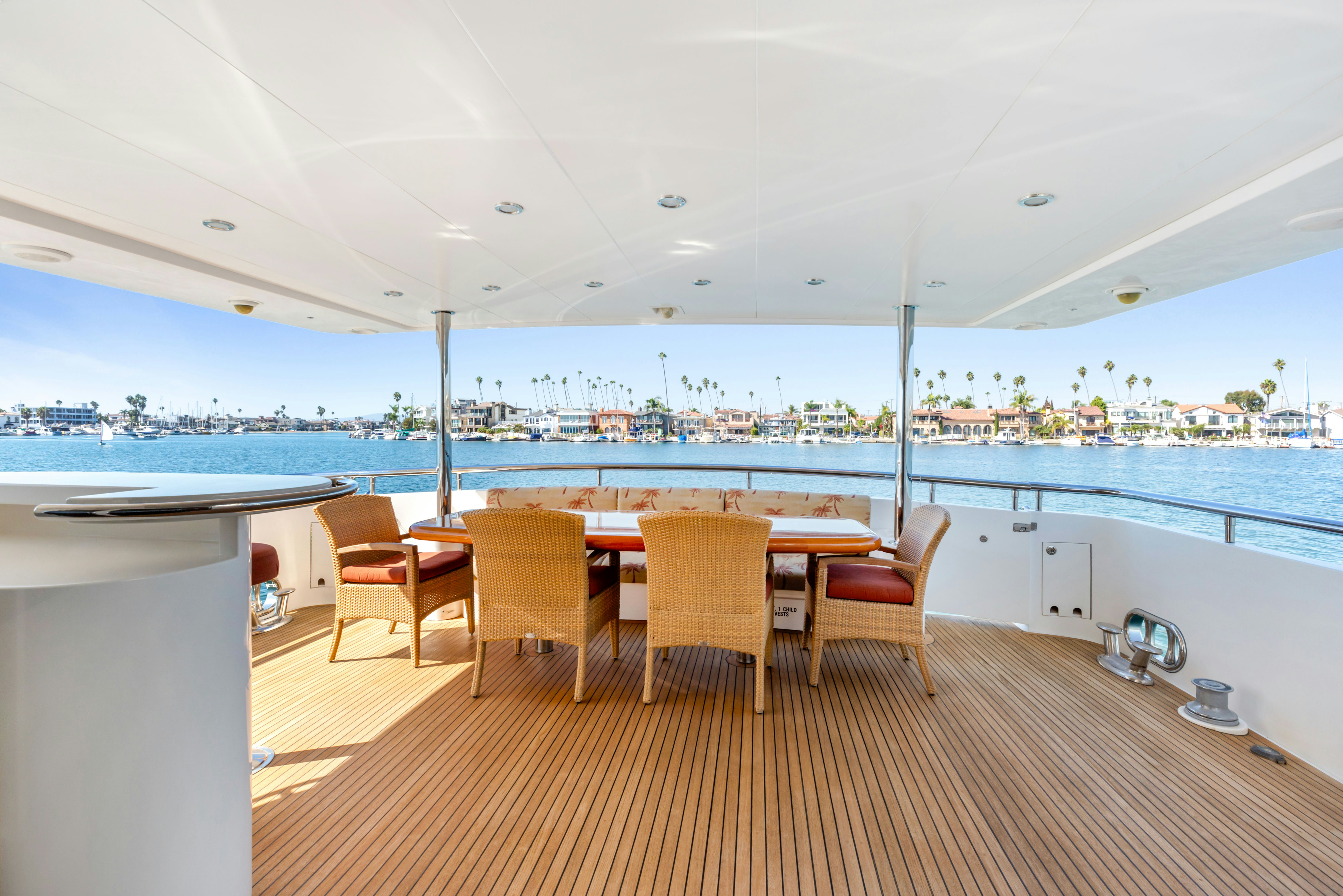 a room with a table and chairs aboard REVERIE Yacht for Sale