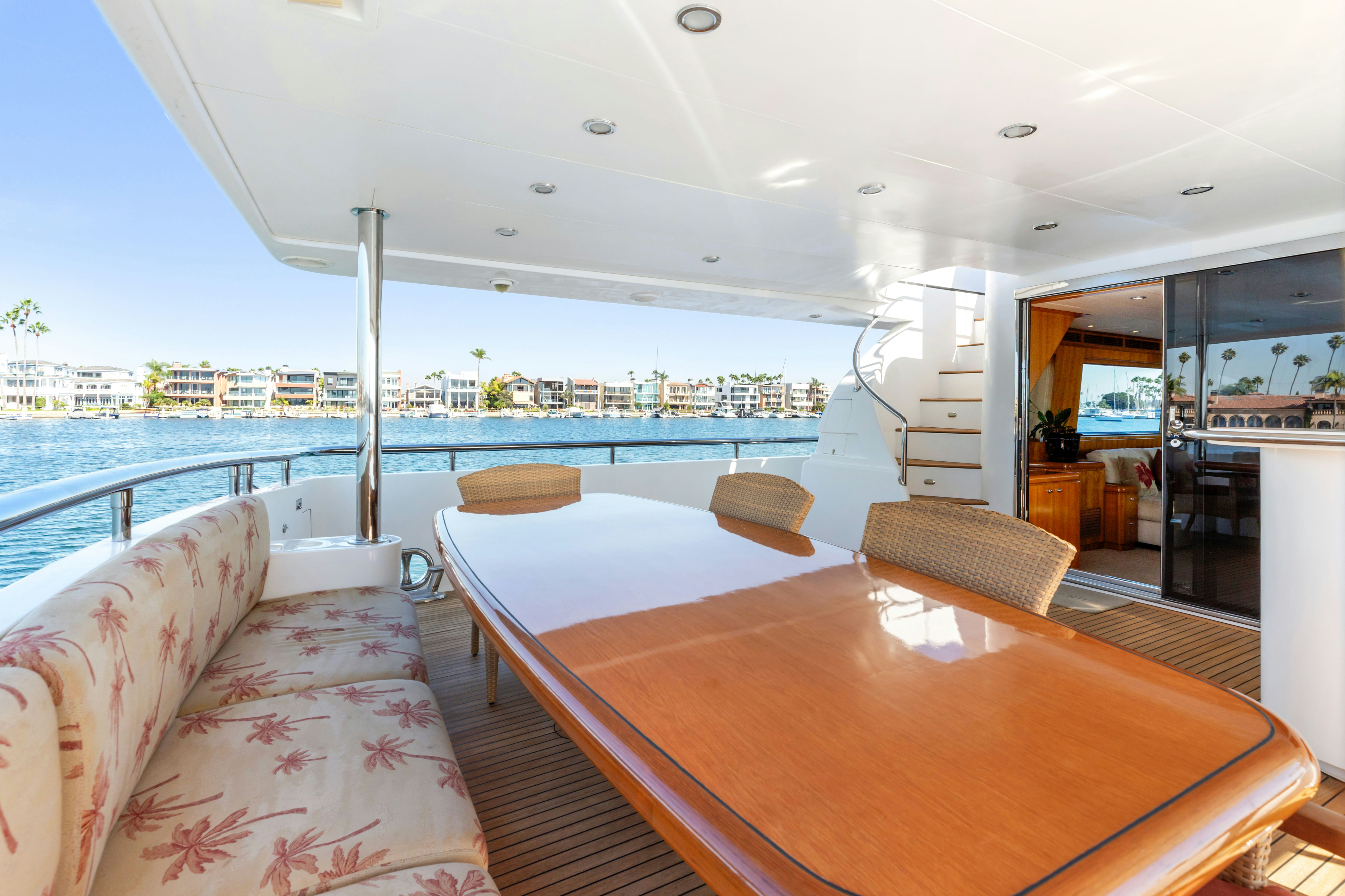 a room with a table and chairs aboard REVERIE Yacht for Sale