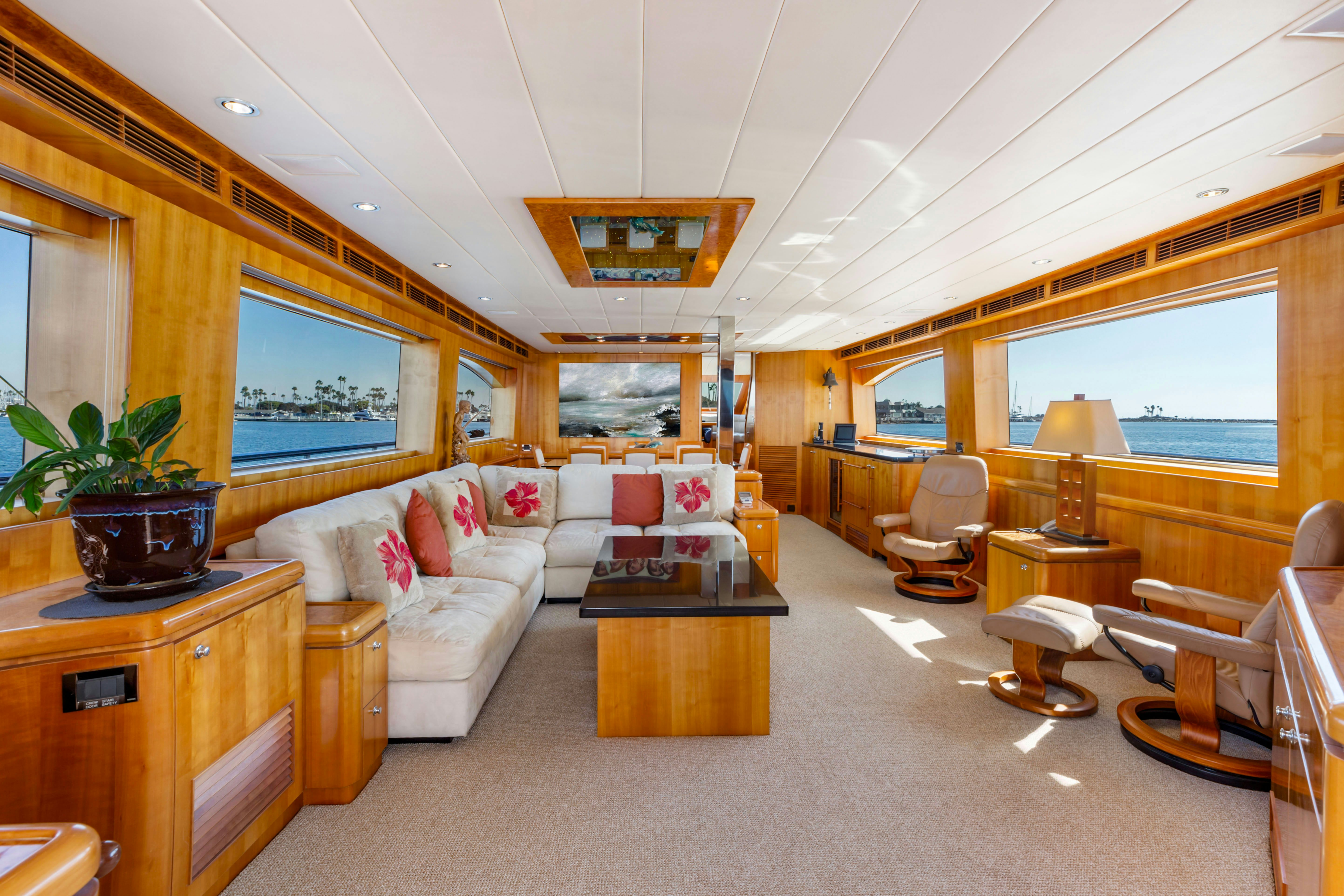 a living room with a large window aboard REVERIE Yacht for Sale