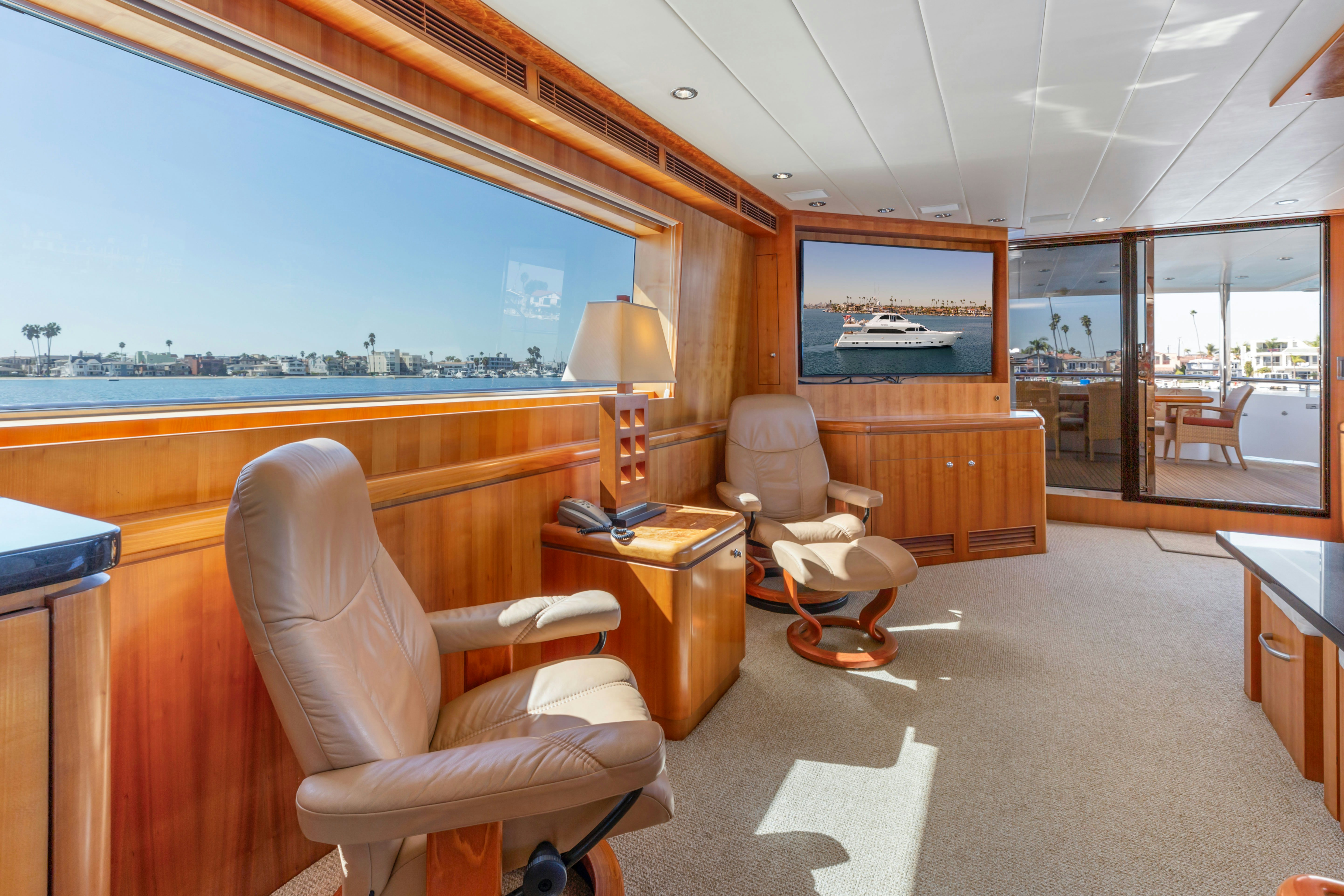 a room with a large screen aboard REVERIE Yacht for Sale