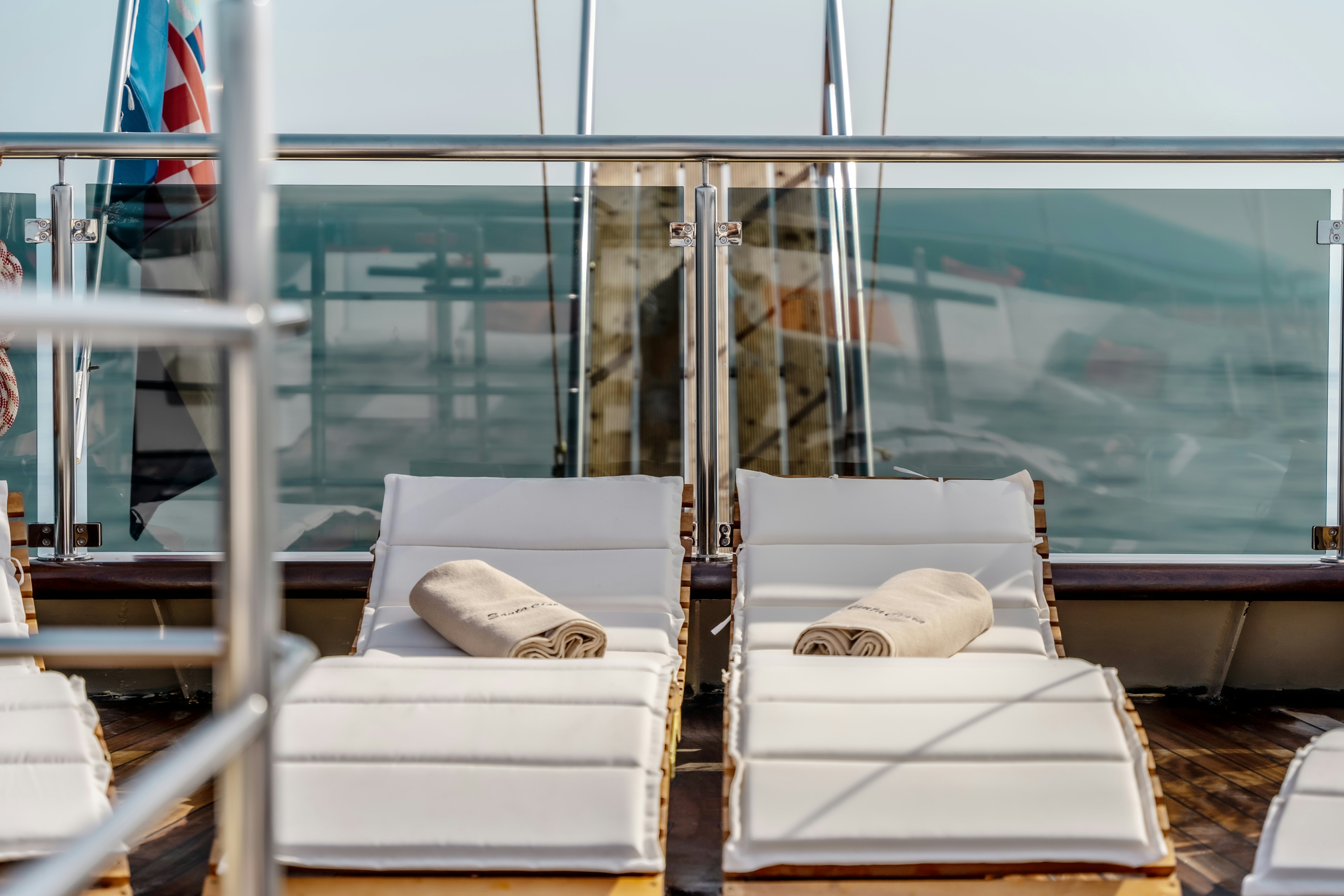 a room with a bed and a window aboard SANTA CLARA Yacht for Charter