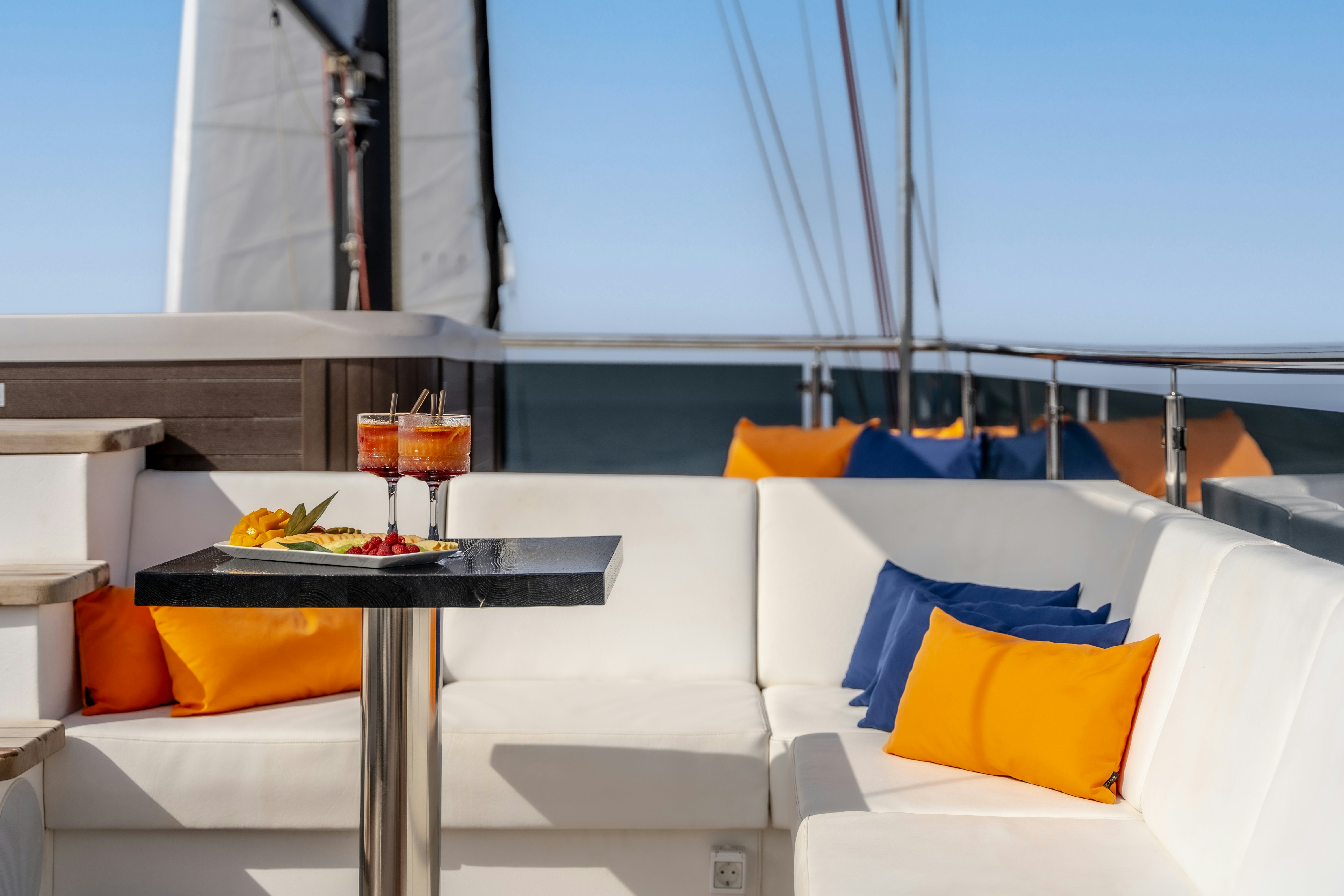 a table with drinks on it aboard SANTA CLARA Yacht for Charter