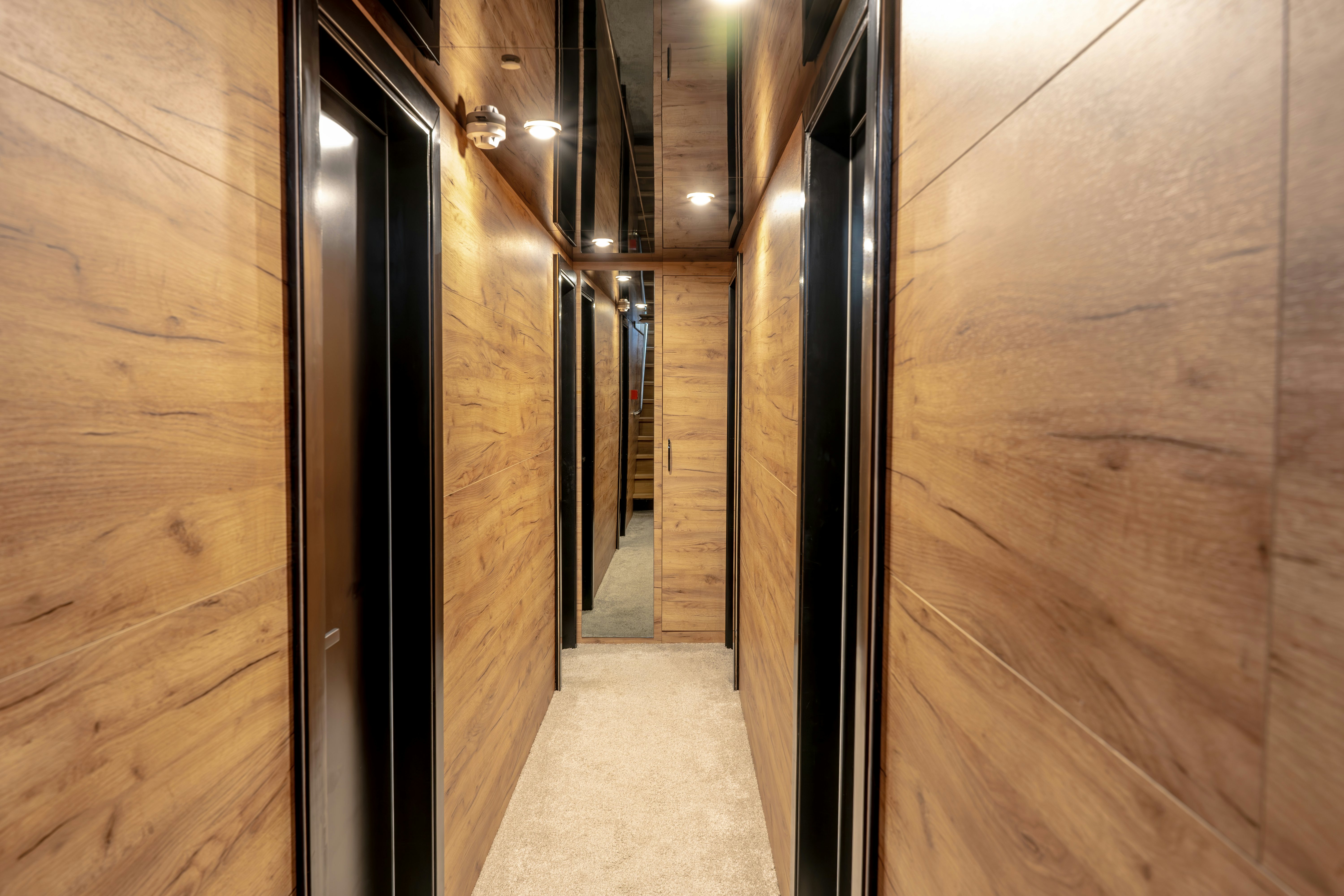 a hallway with a door aboard SANTA CLARA Yacht for Charter