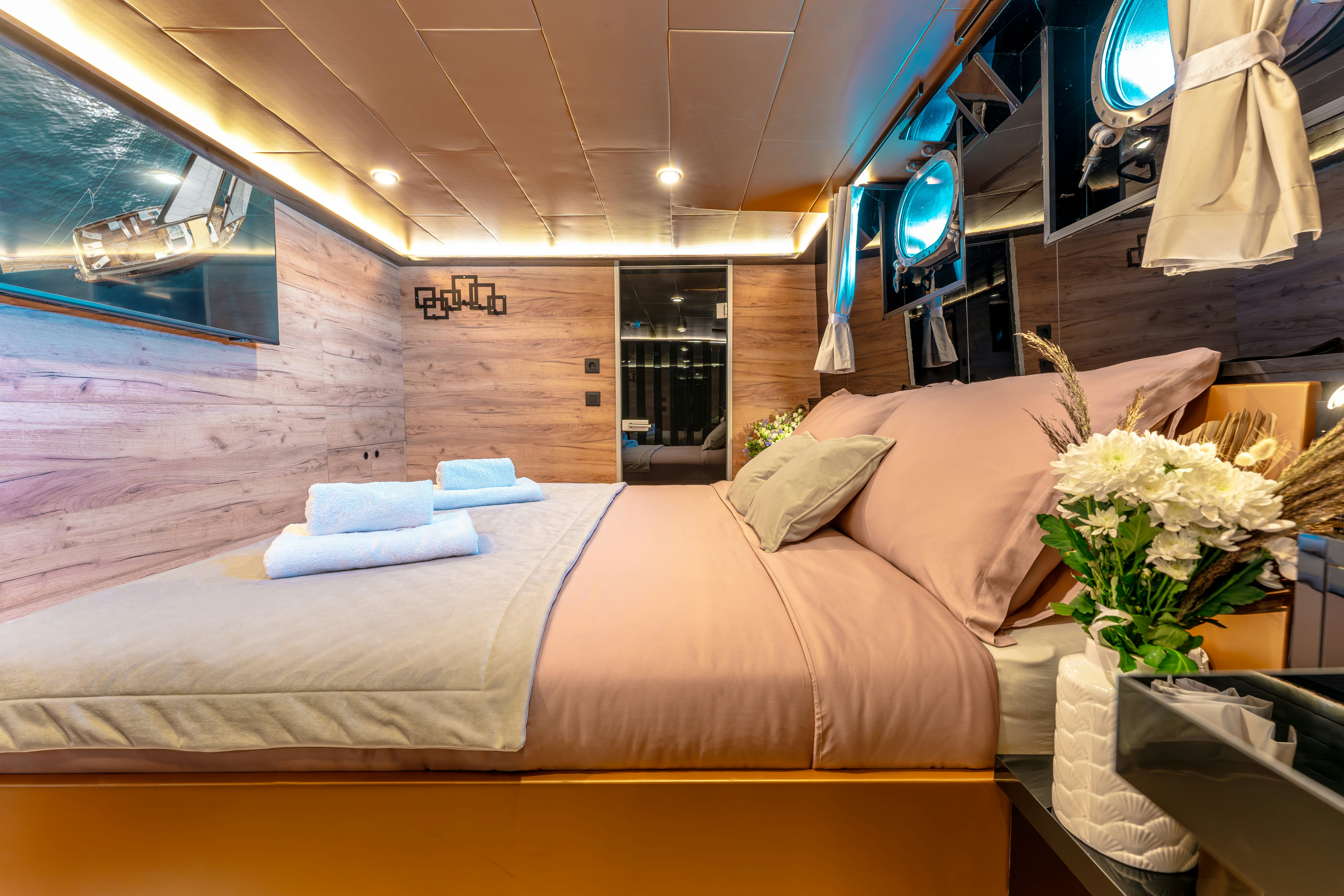 a bed with a large bed aboard SANTA CLARA Yacht for Charter