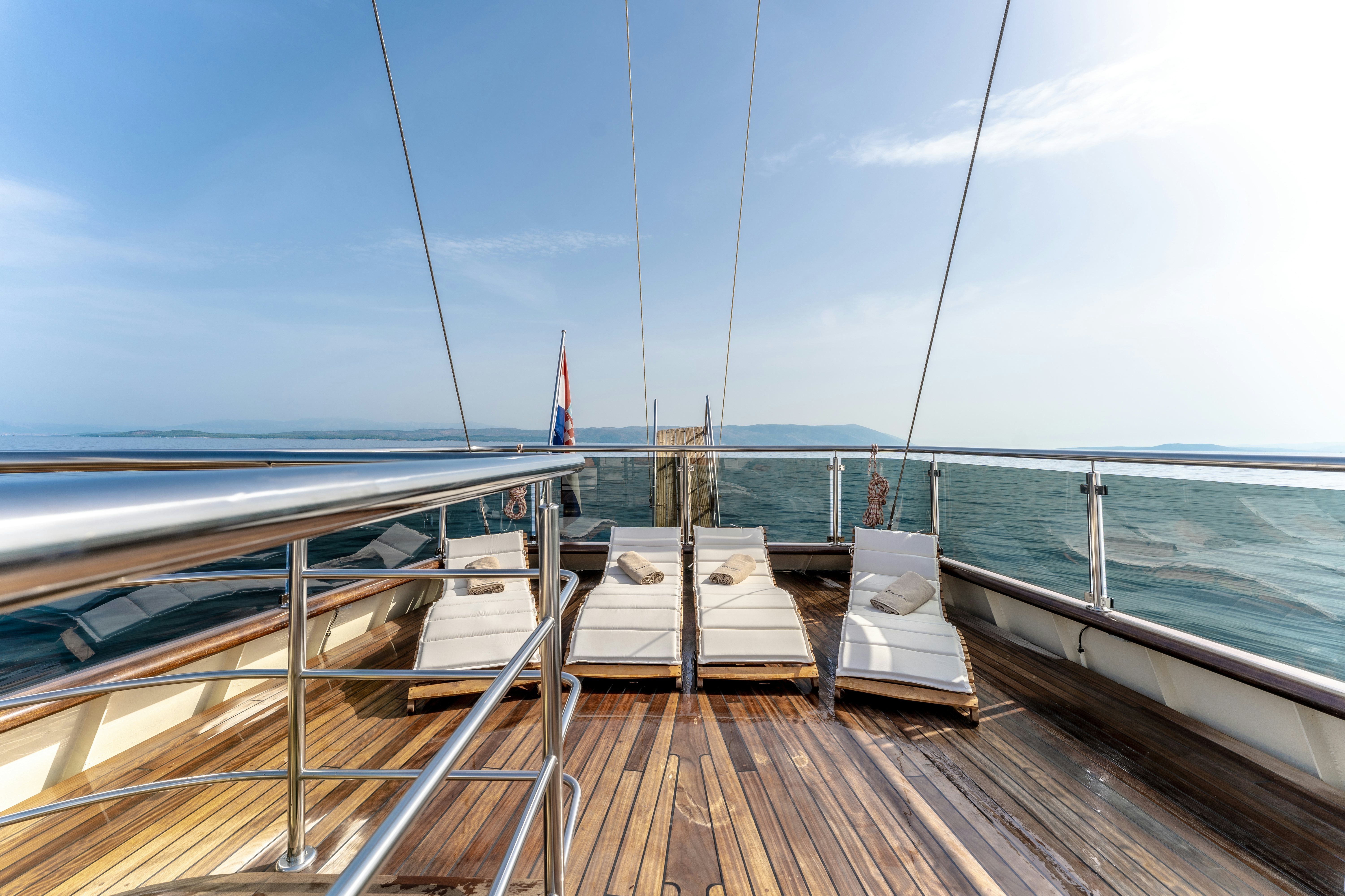 a deck with a boat on it aboard SANTA CLARA Yacht for Charter