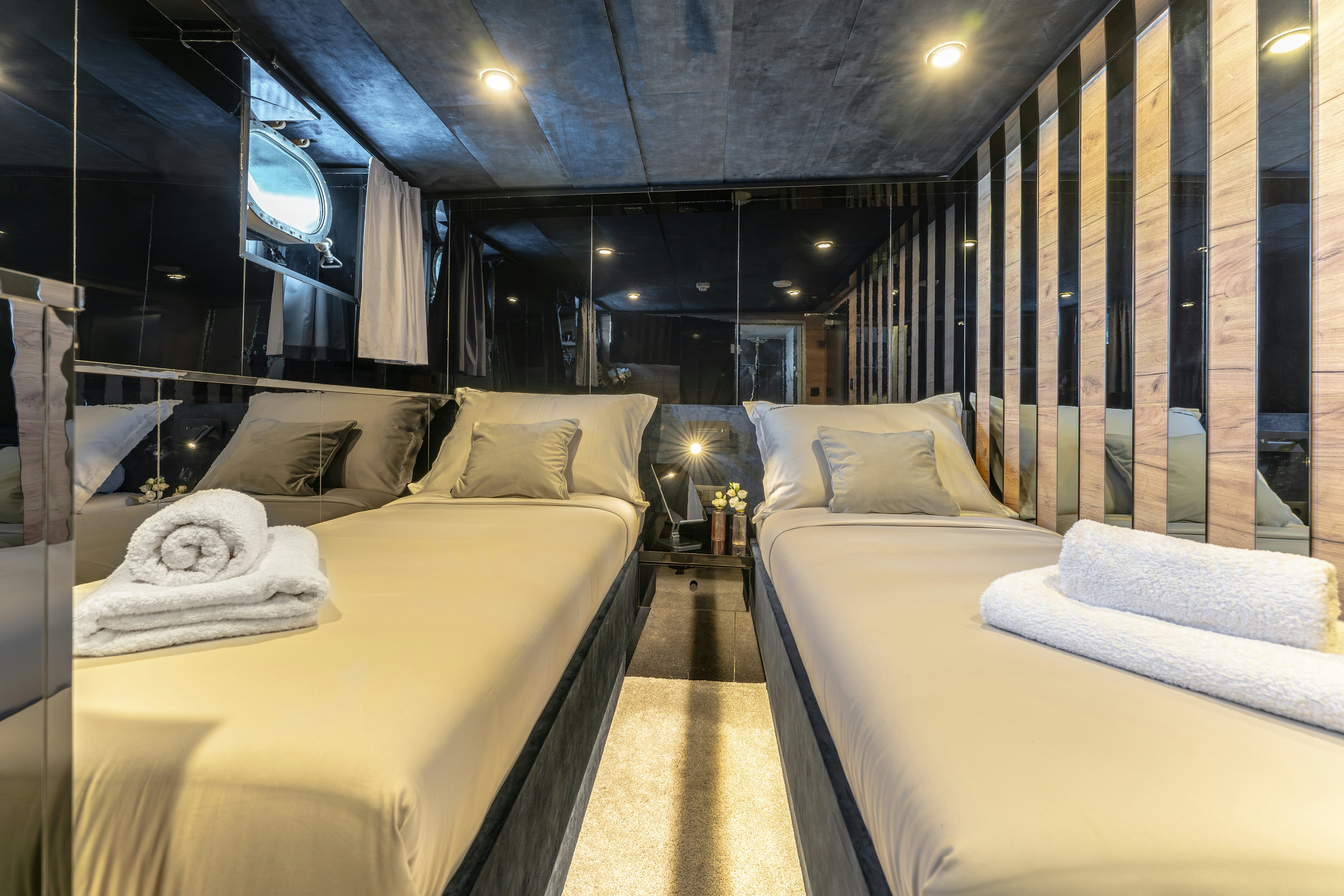 a room with two beds aboard SANTA CLARA Yacht for Charter