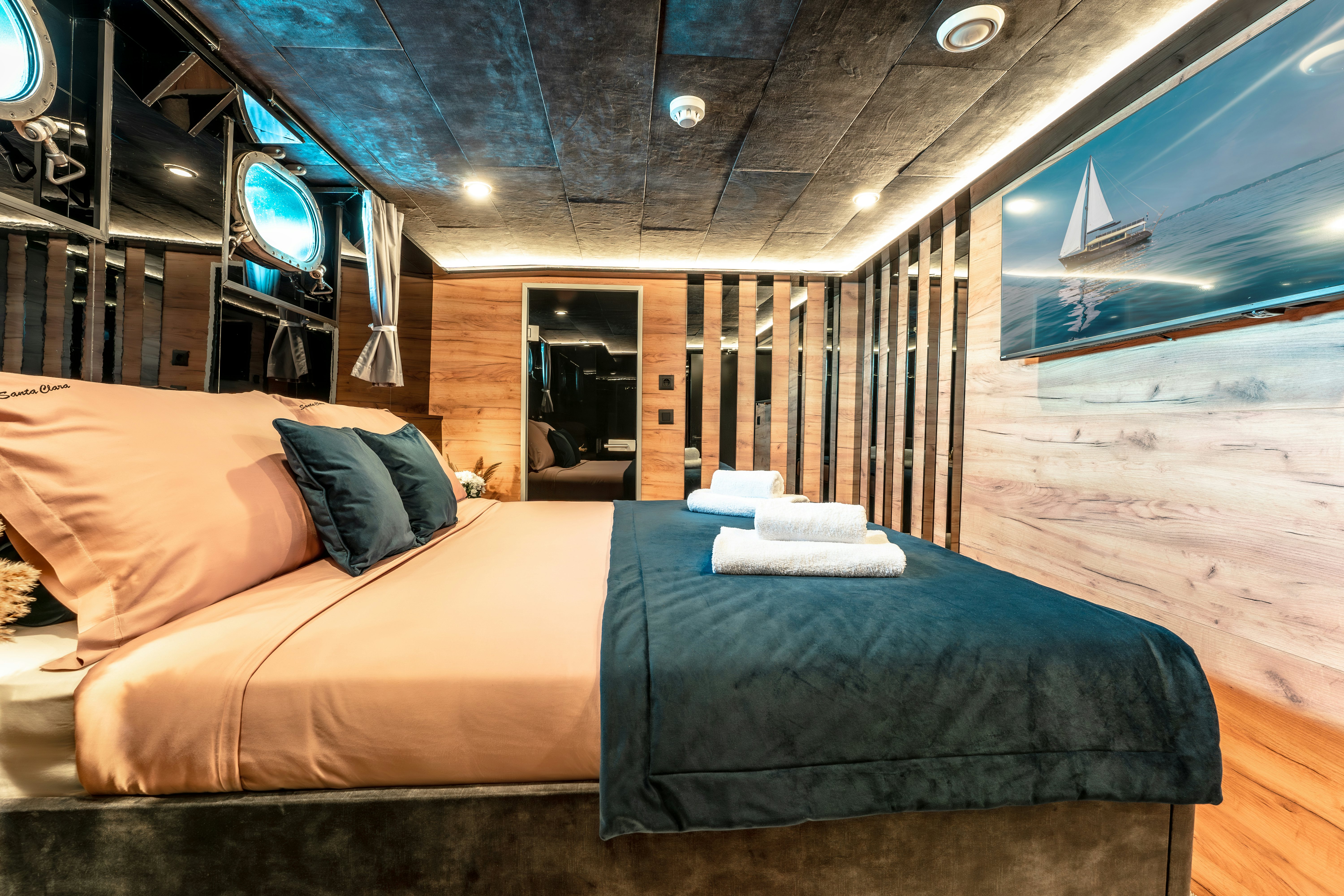 a bed in a room aboard SANTA CLARA Yacht for Charter