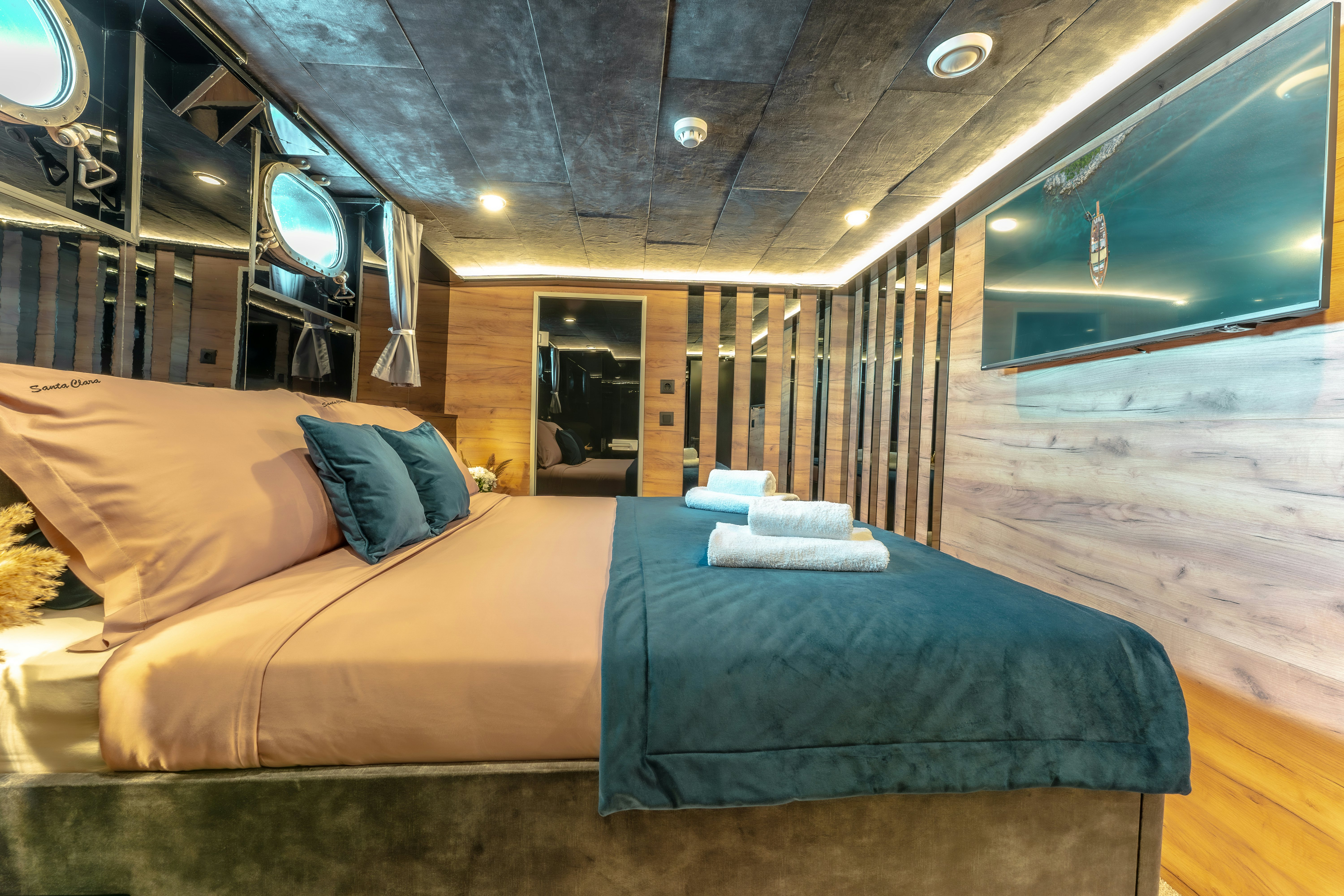 a bed in a cabin aboard SANTA CLARA Yacht for Charter