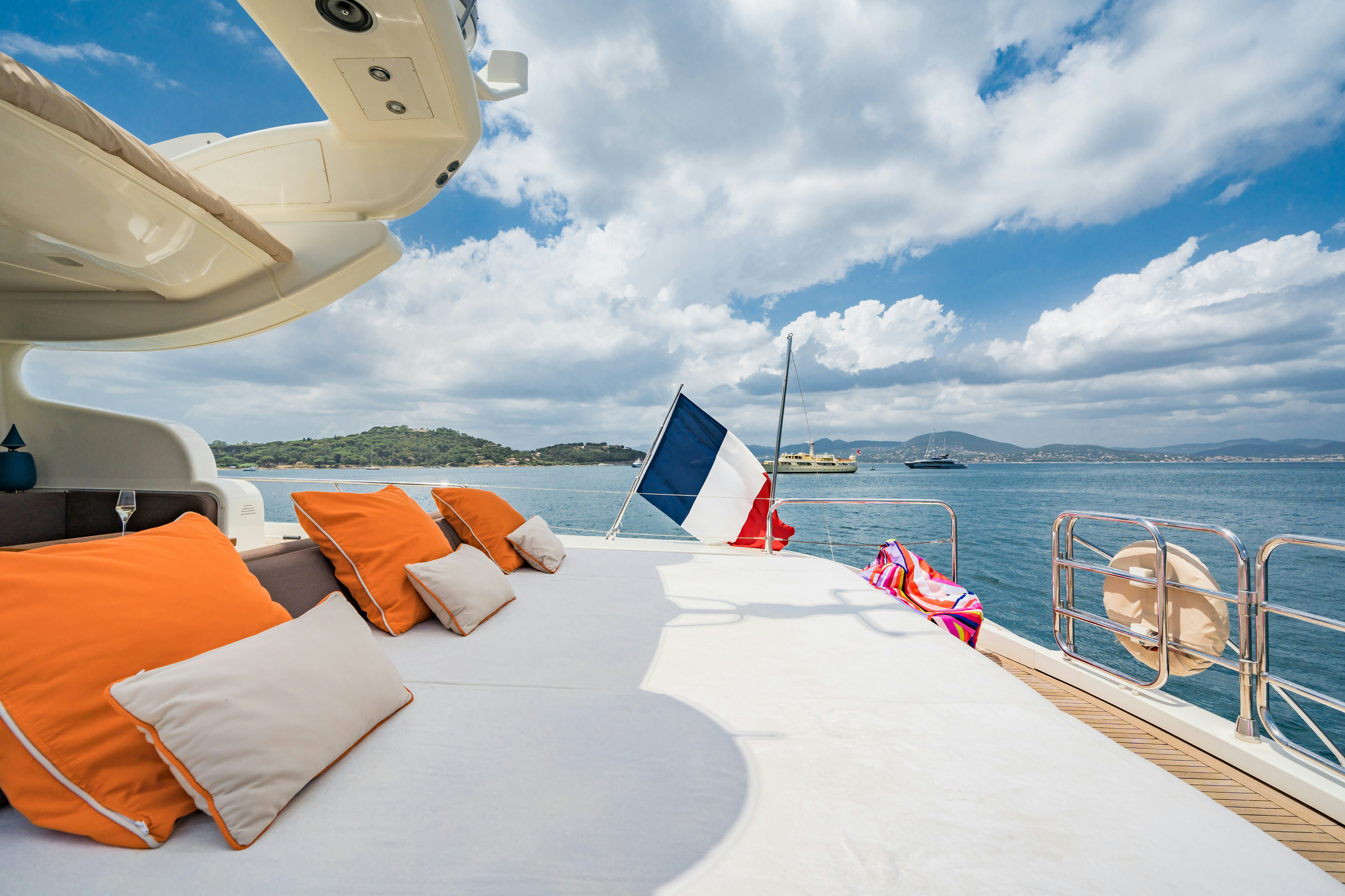 a boat on a beach aboard ECLAT Yacht for Charter