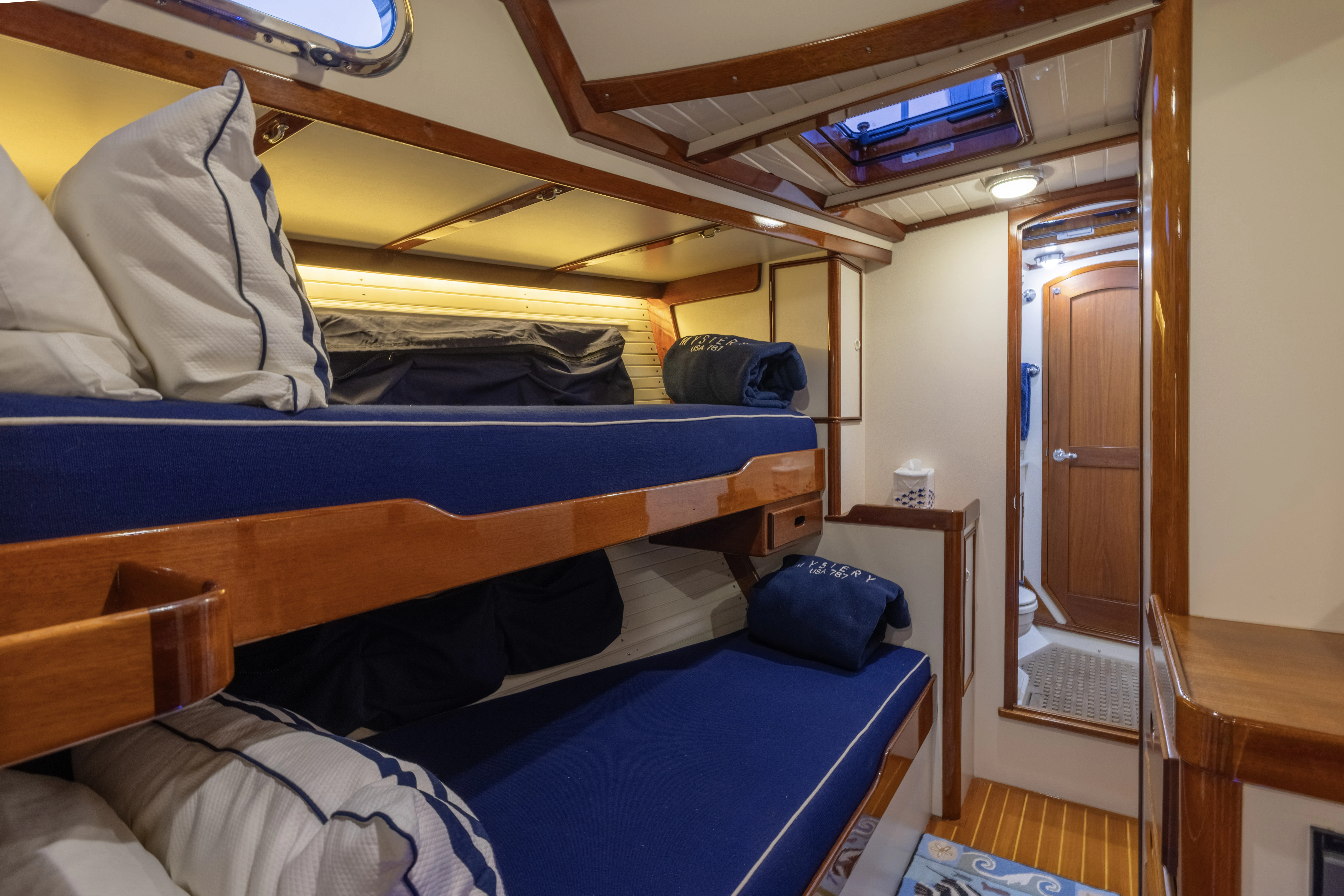 a room with bunk beds aboard MYSTERY Yacht for Sale