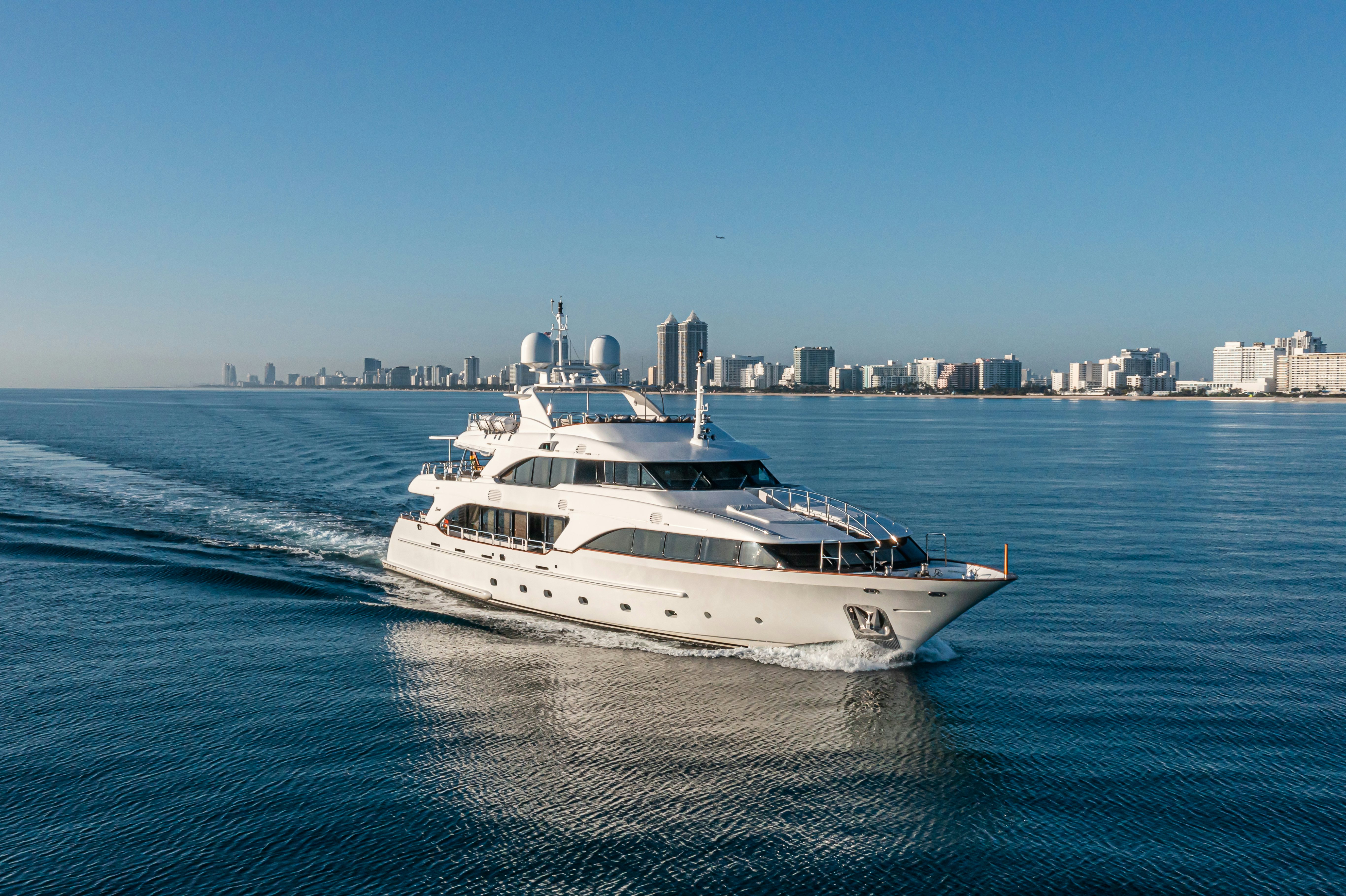 a white yacht in the water aboard ARTHUR’S WAY Yacht for Charter