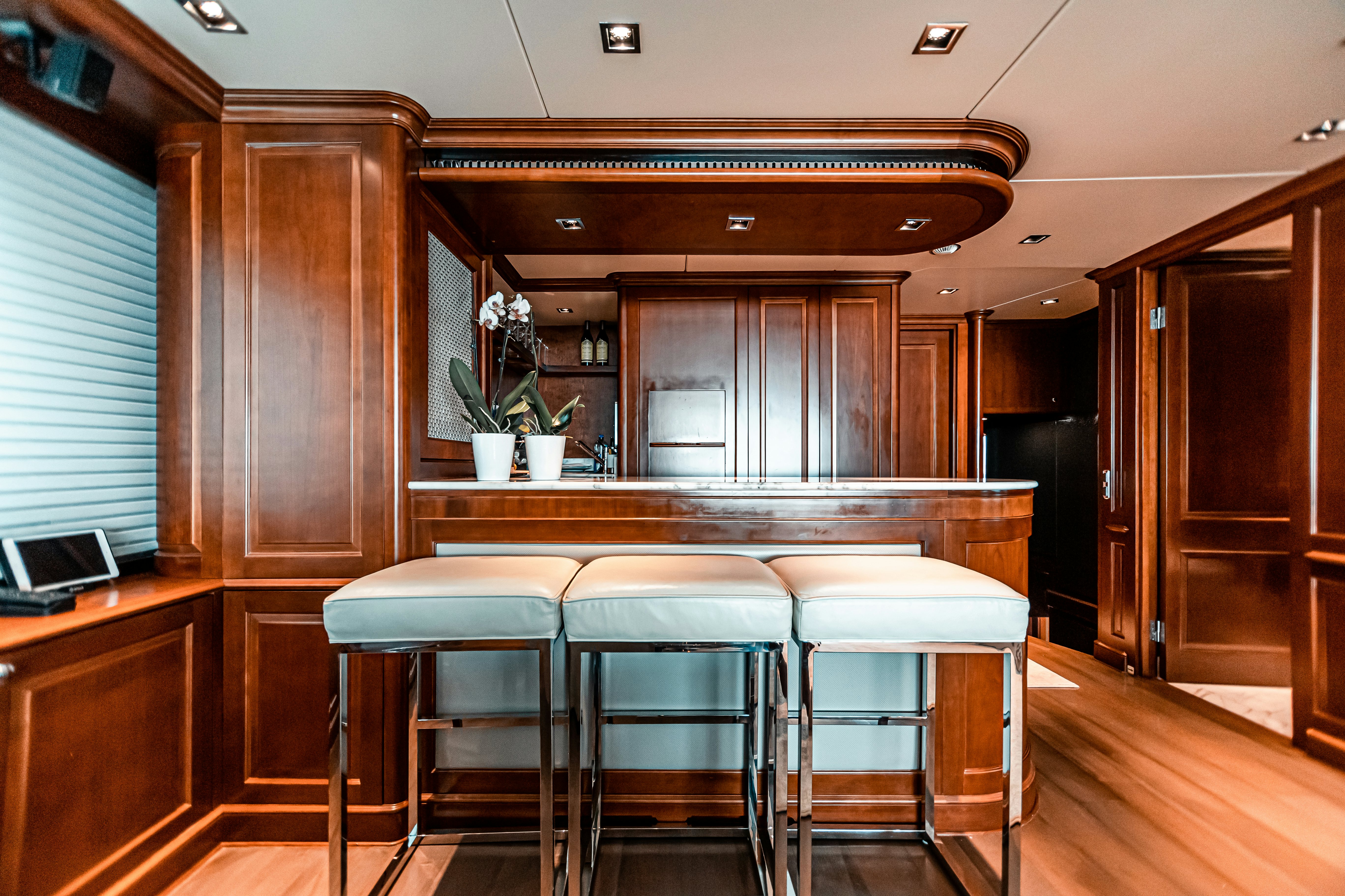 a room with a table and chairs aboard ARTHUR’S WAY Yacht for Charter