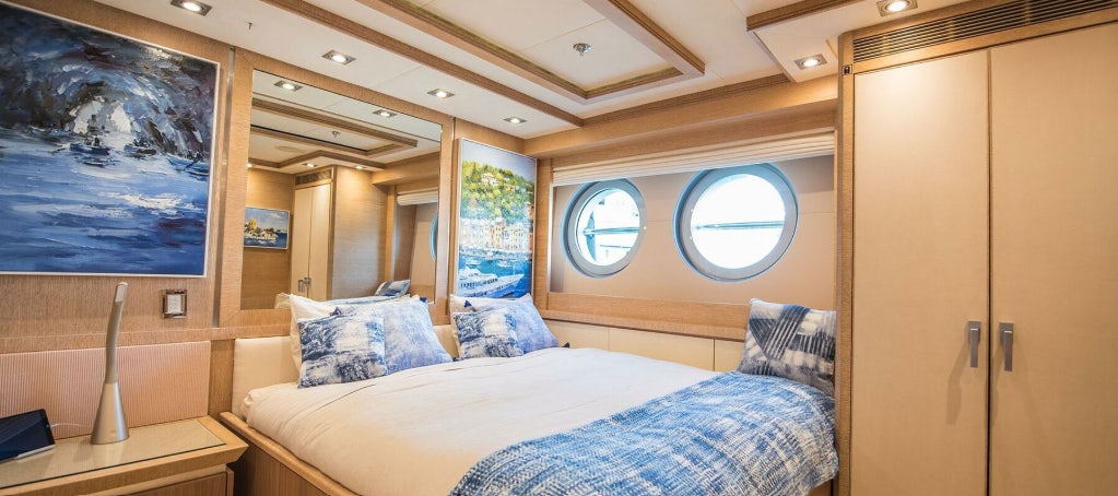 a room with two beds aboard NORMA JEAN Yacht for Charter