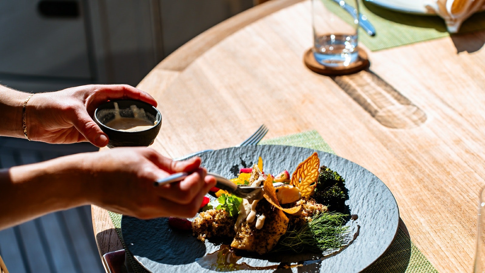 a person eating food aboard NORMA JEAN Yacht for Charter