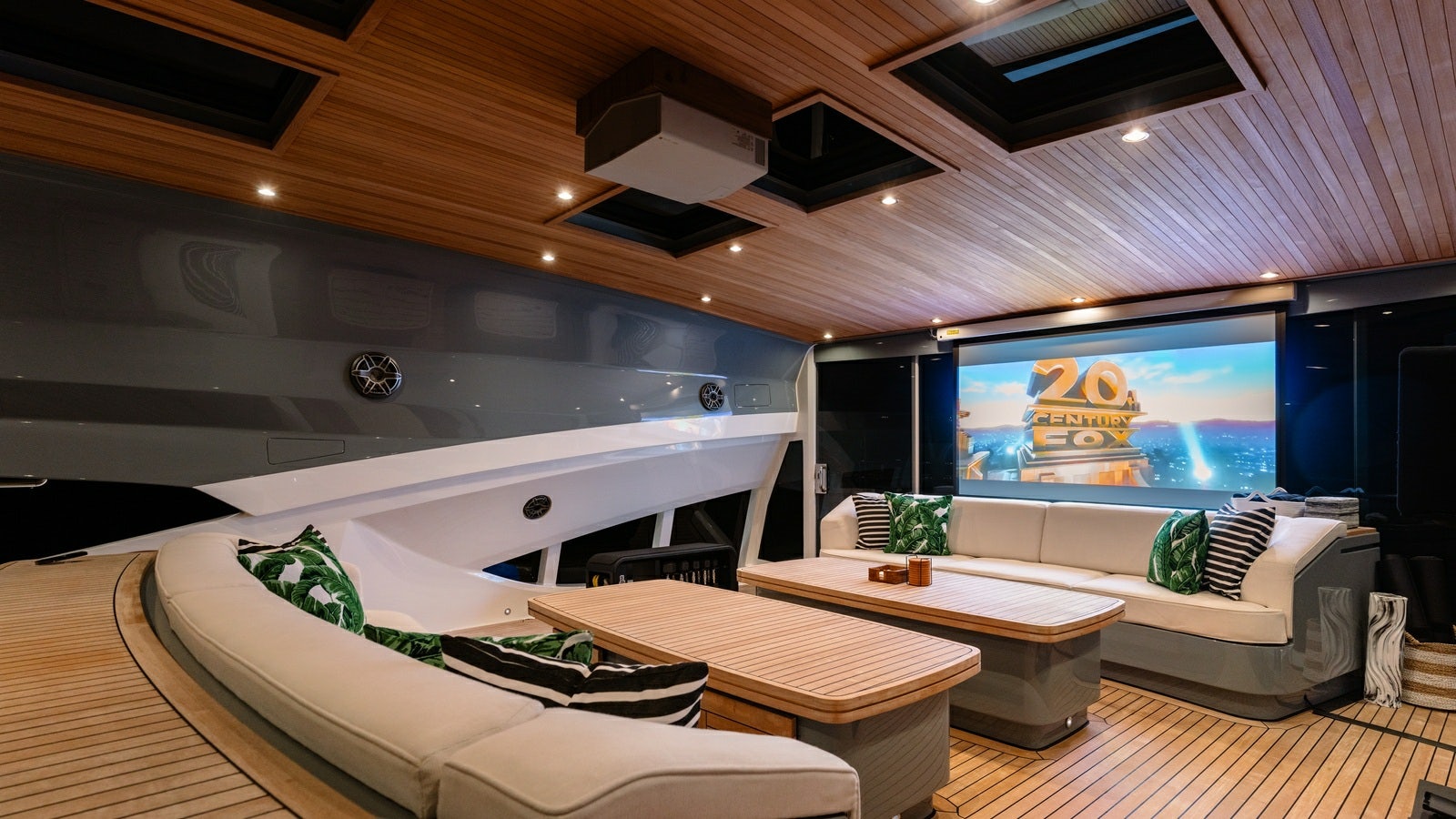 a room with a table and couches aboard NORMA JEAN Yacht for Charter