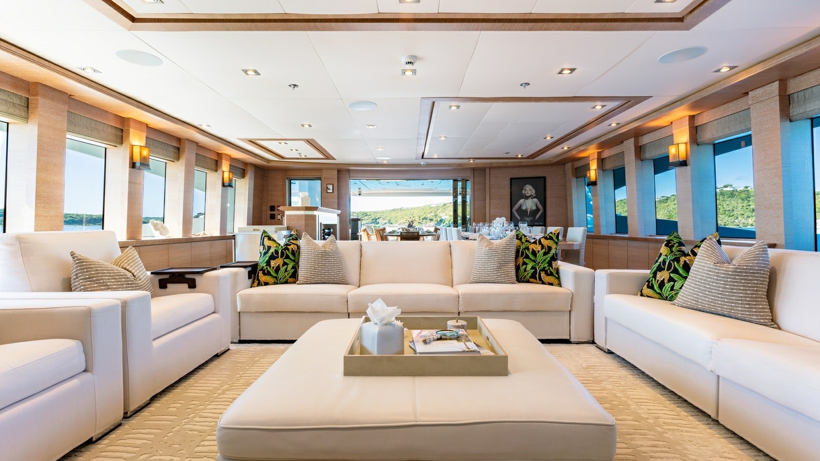 a living room with white couches aboard NORMA JEAN Yacht for Charter
