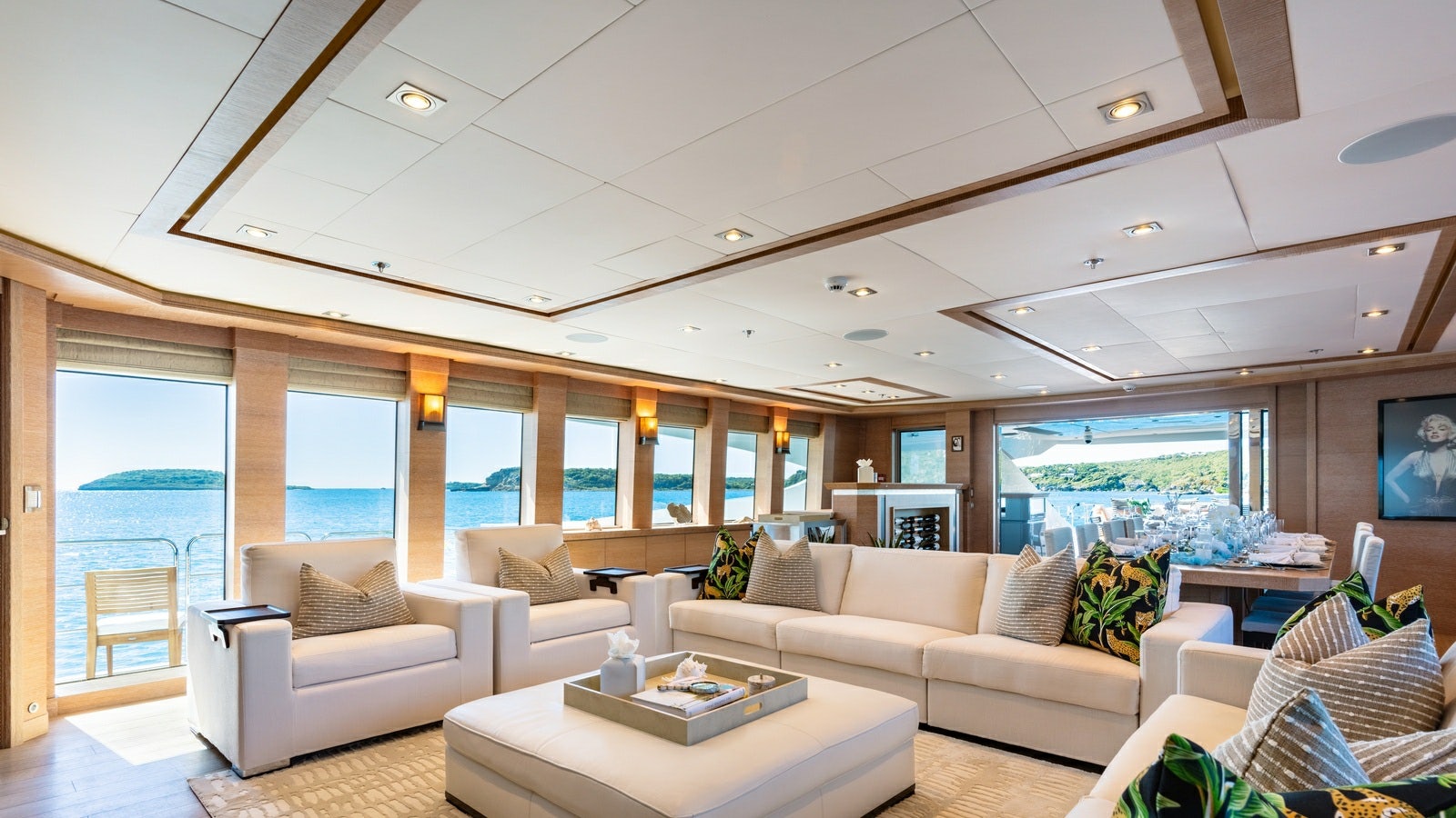 a living room with a large window aboard NORMA JEAN Yacht for Charter